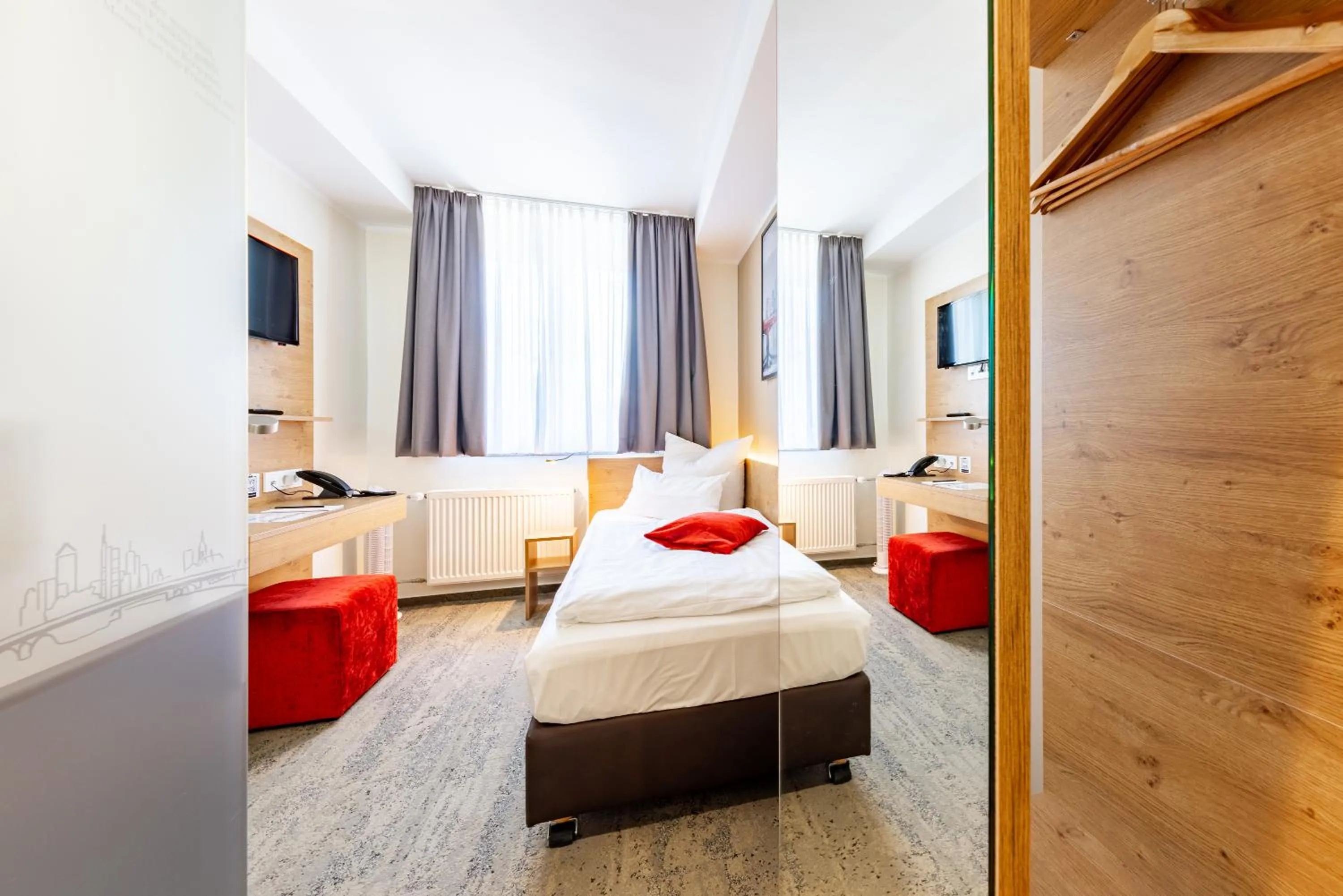 Bed in Maingau Hotel