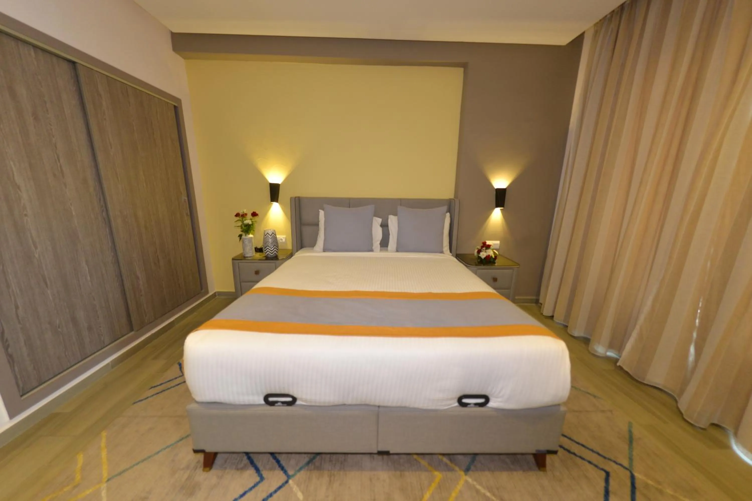 Bed in Gardenia Boutique Hotel
