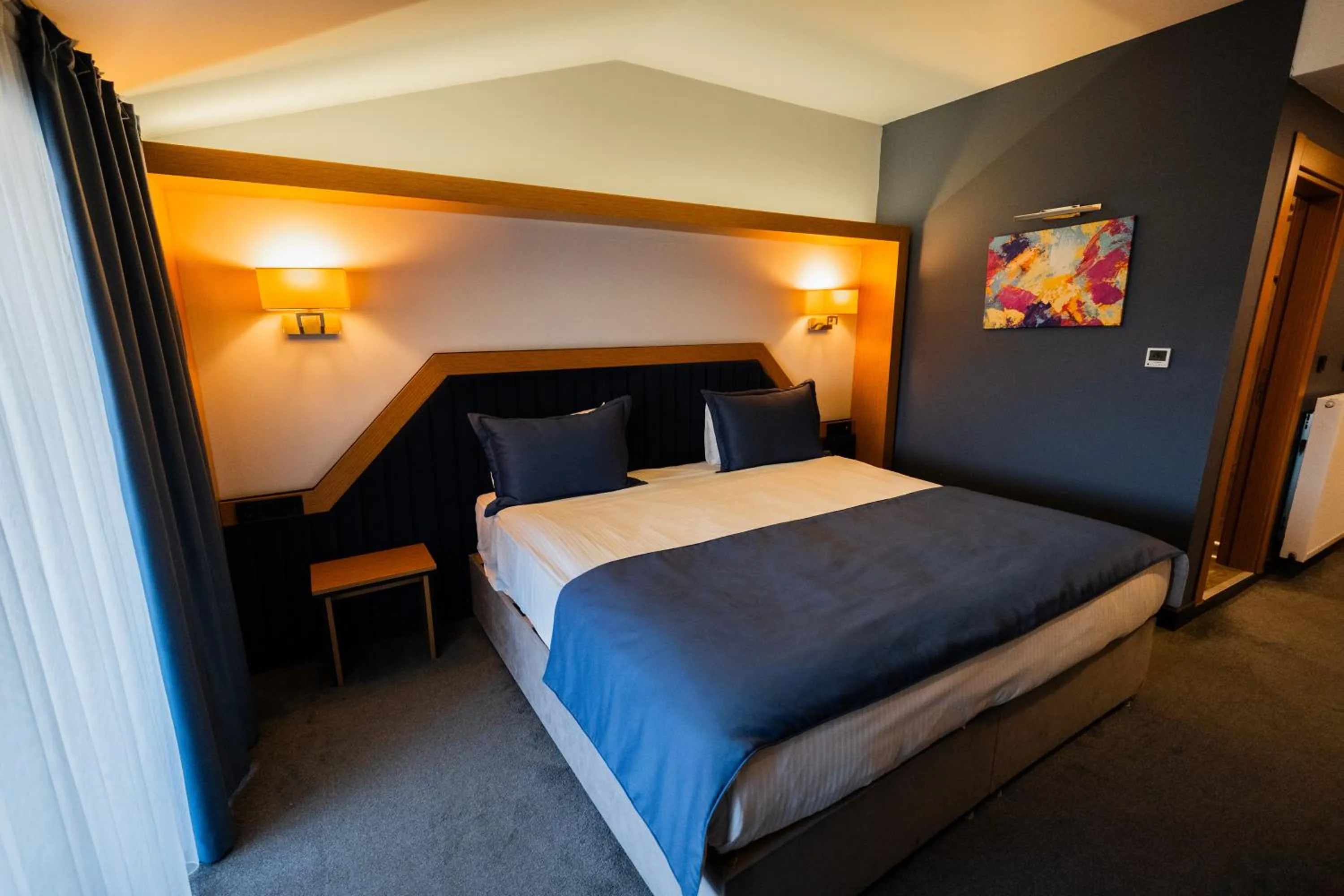 Bed in Roof 264 Hotel & Suites