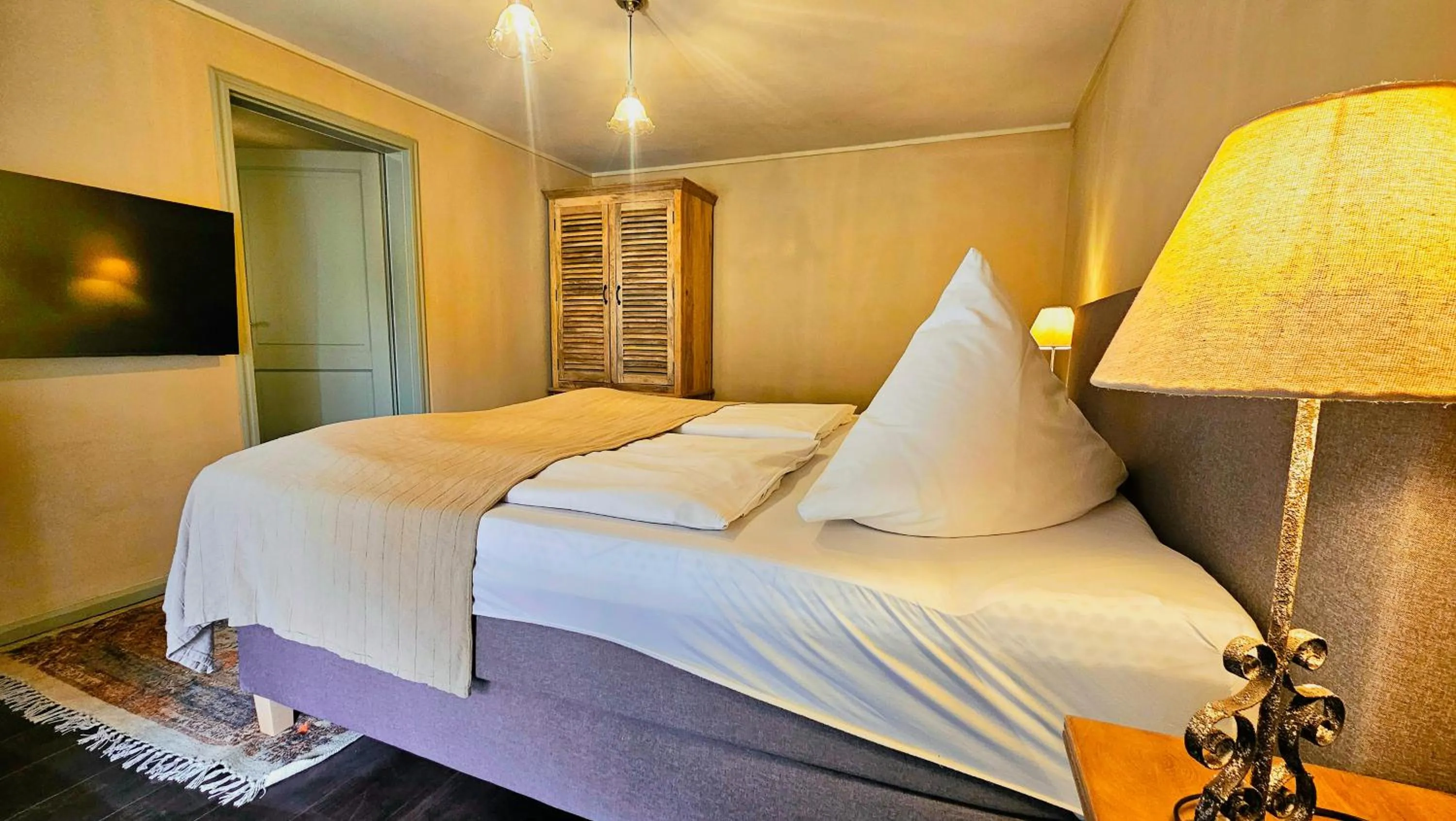 Bed in Boutique-Hotel & Wellness Goldenes Fass Meißen