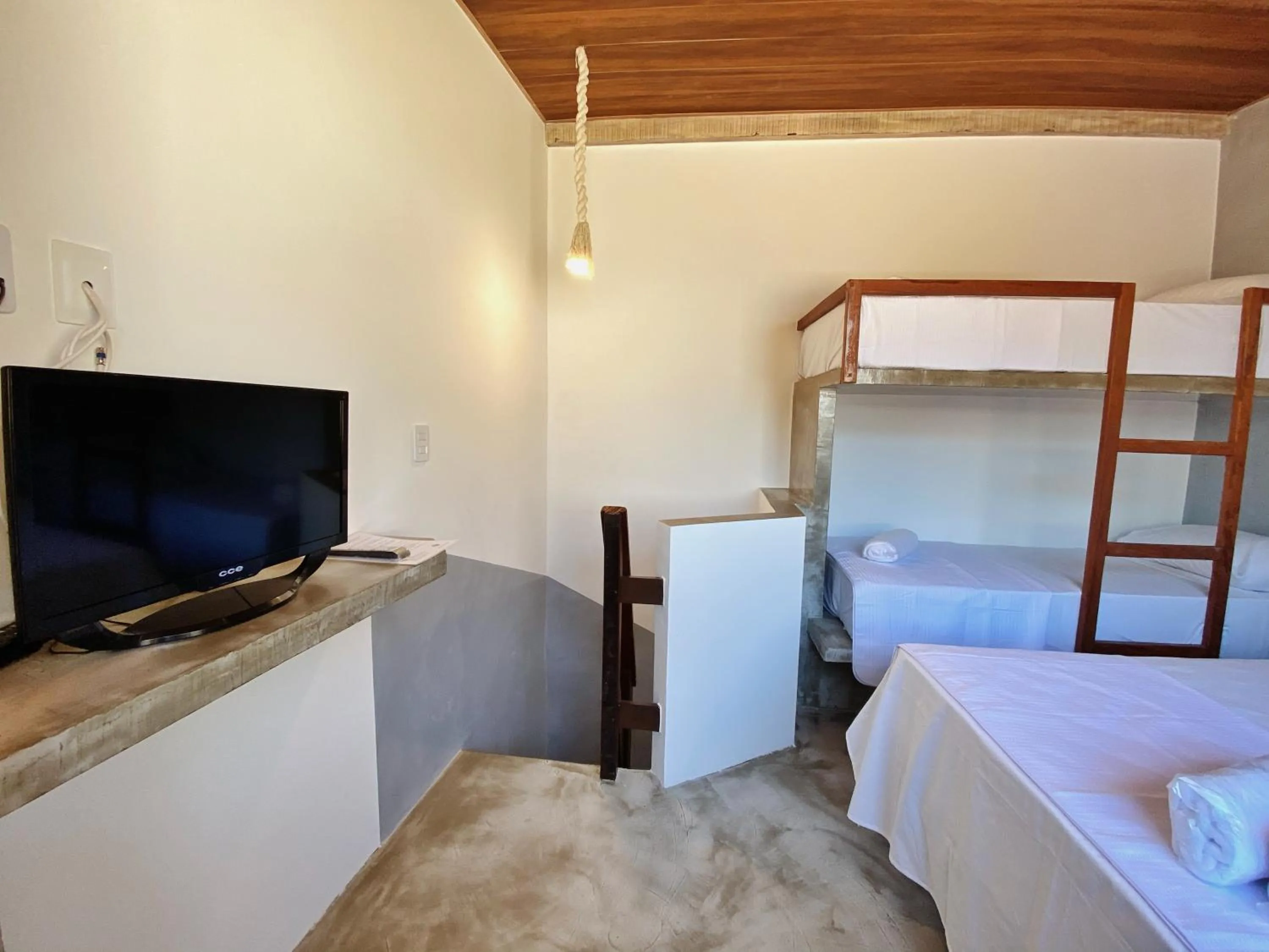 Bed in Pousada Primeira Praia Suítes