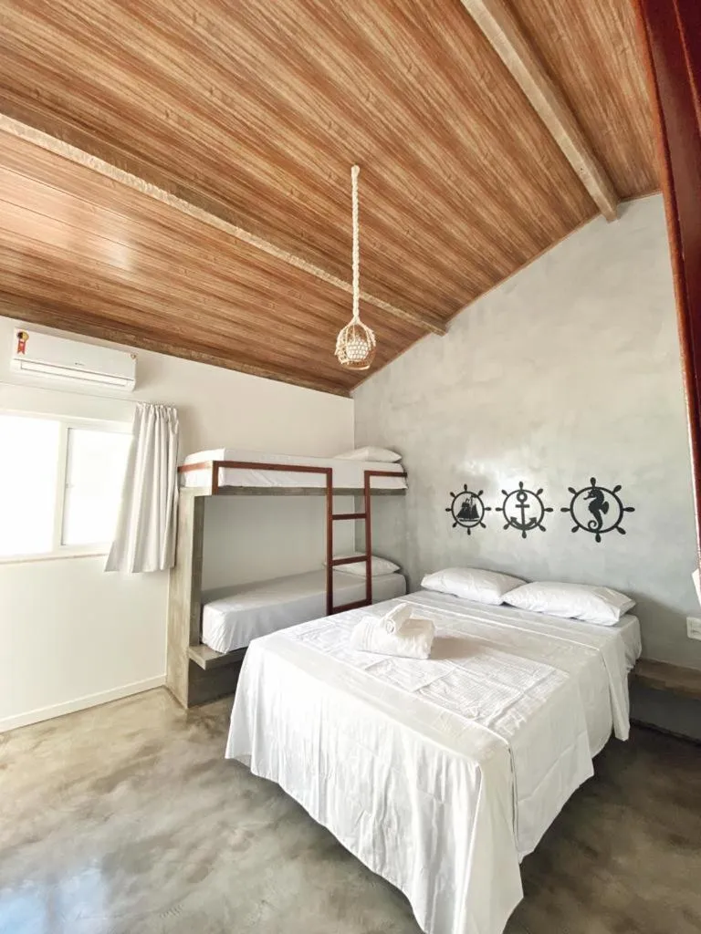 Bed in Pousada Primeira Praia Suítes