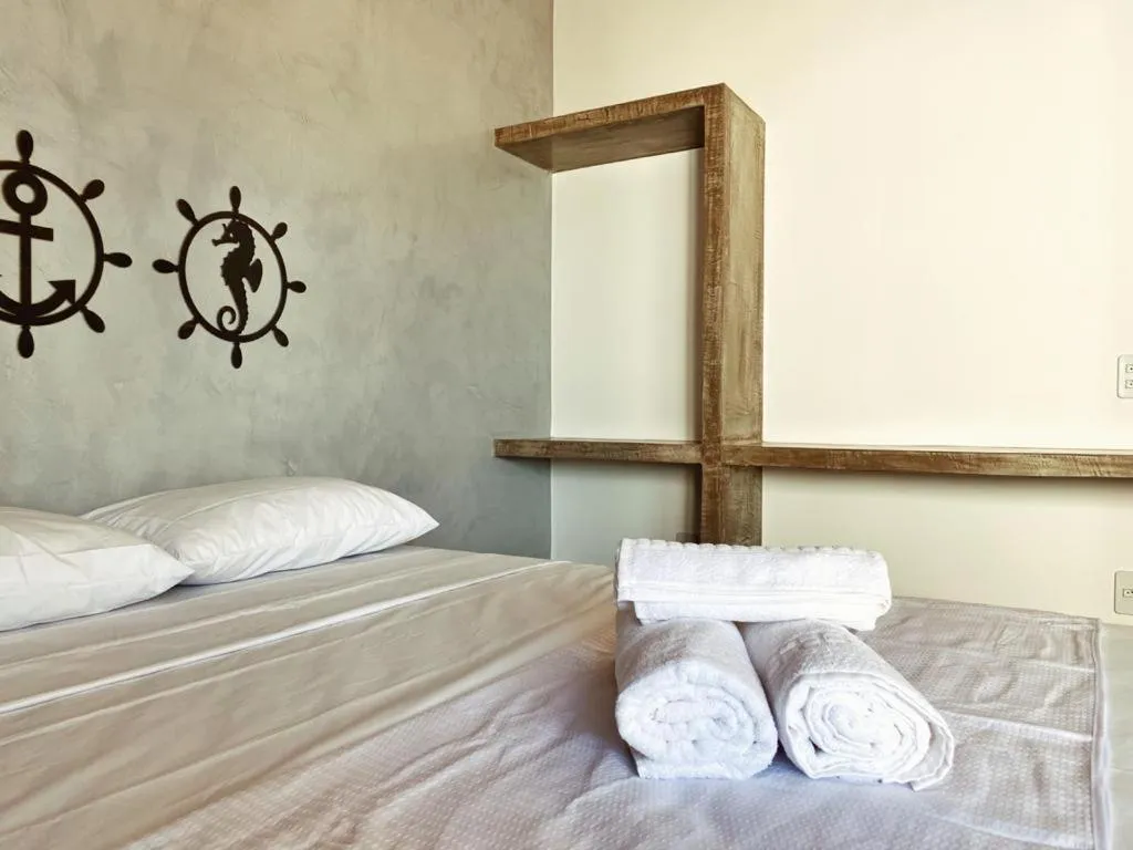 Bed in Pousada Primeira Praia Suítes