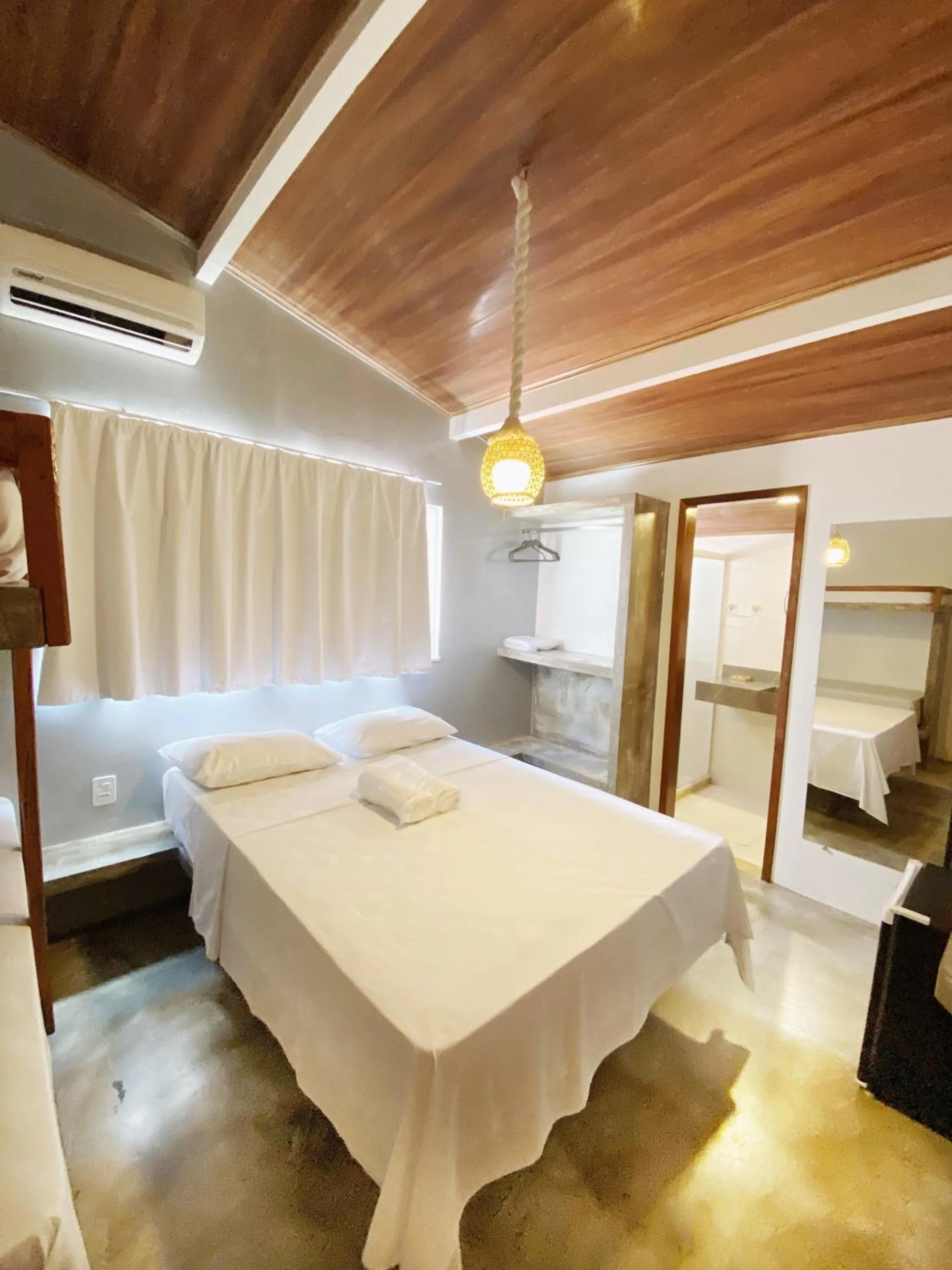 Bed in Pousada Primeira Praia Suítes