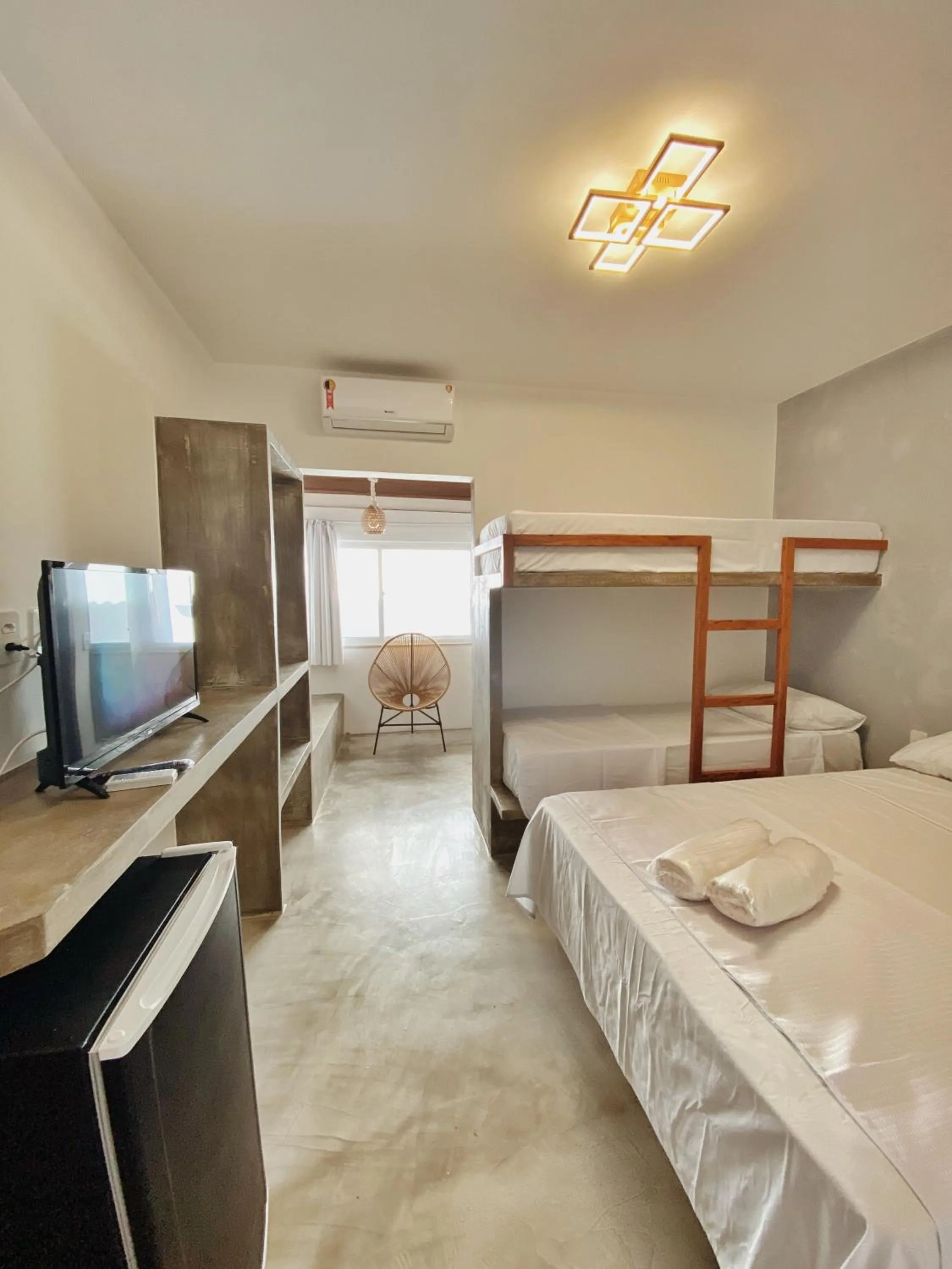 Bed in Pousada Primeira Praia Suítes