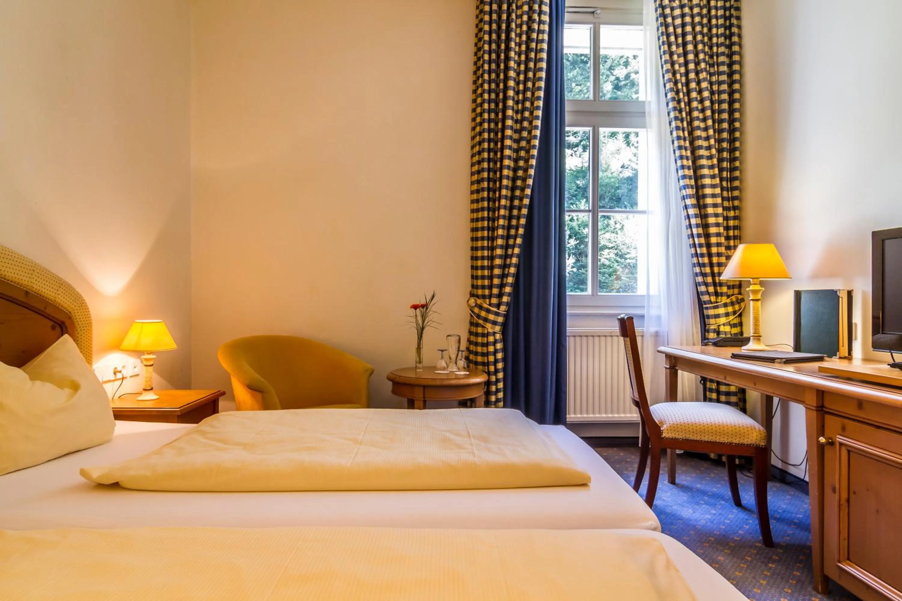 Photo of the whole room, Bed in Waldhotel Bad Sulzburg