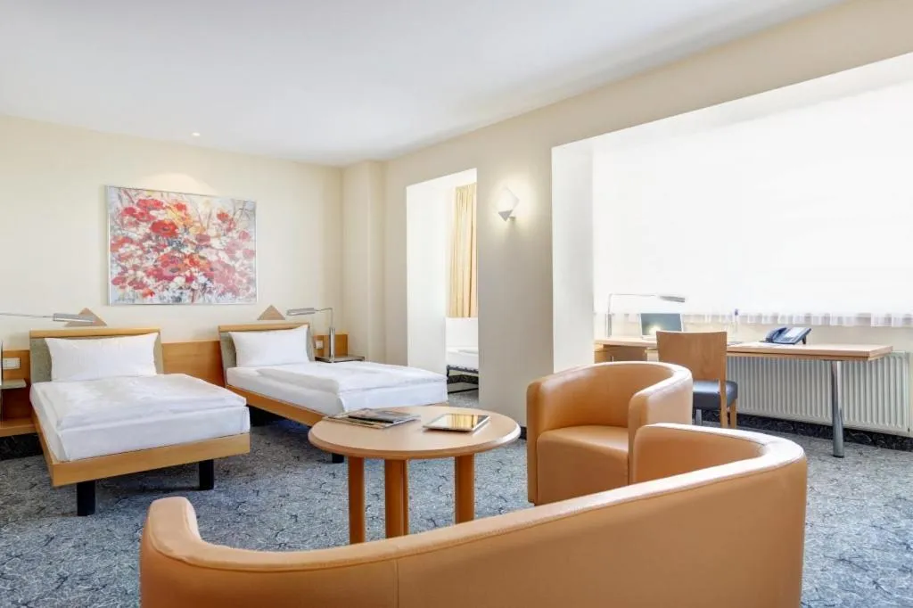 Photo of the whole room, Bed in ABACUS Tierpark Hotel