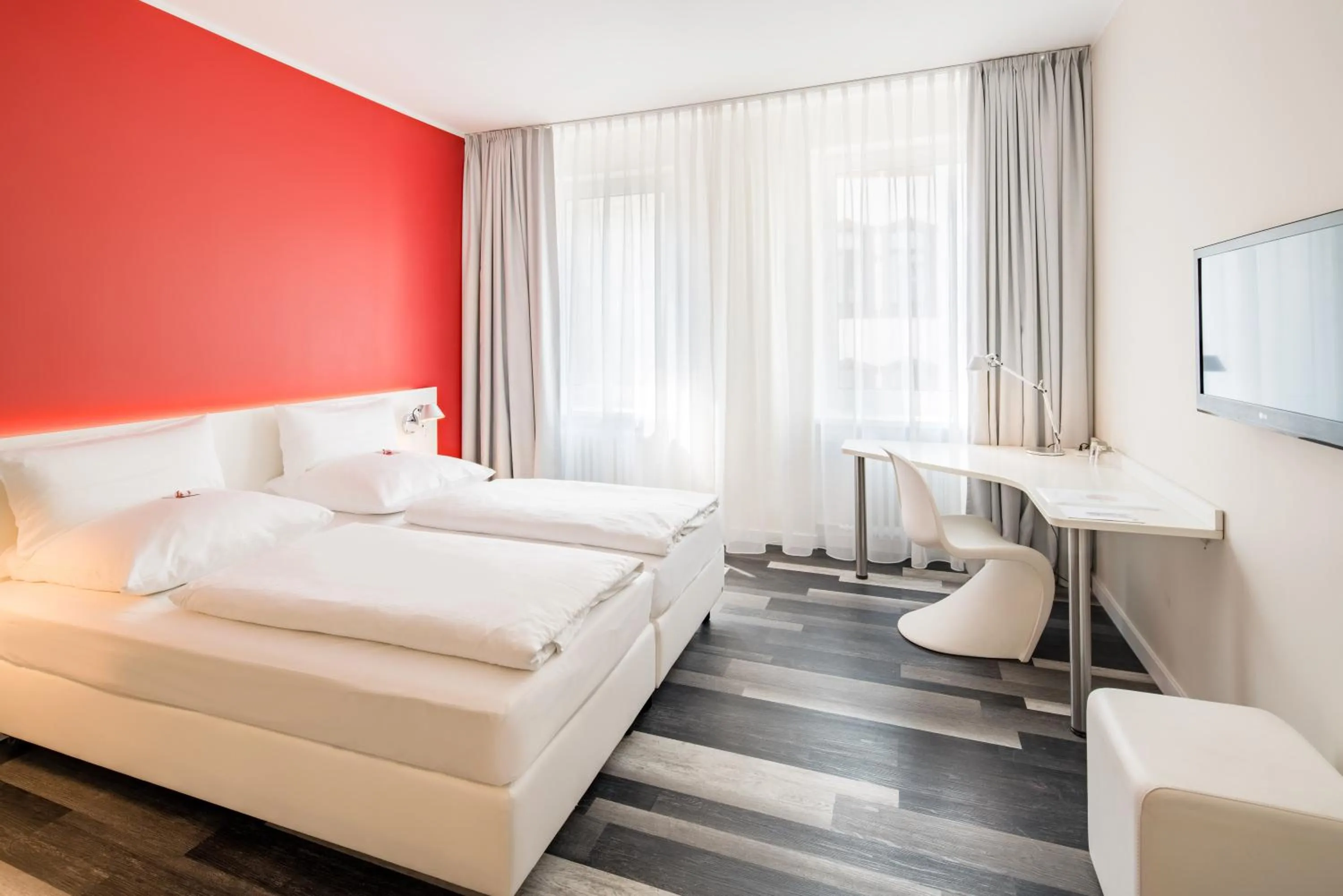 Photo of the whole room, Bed in Cityhotel am Thielenplatz