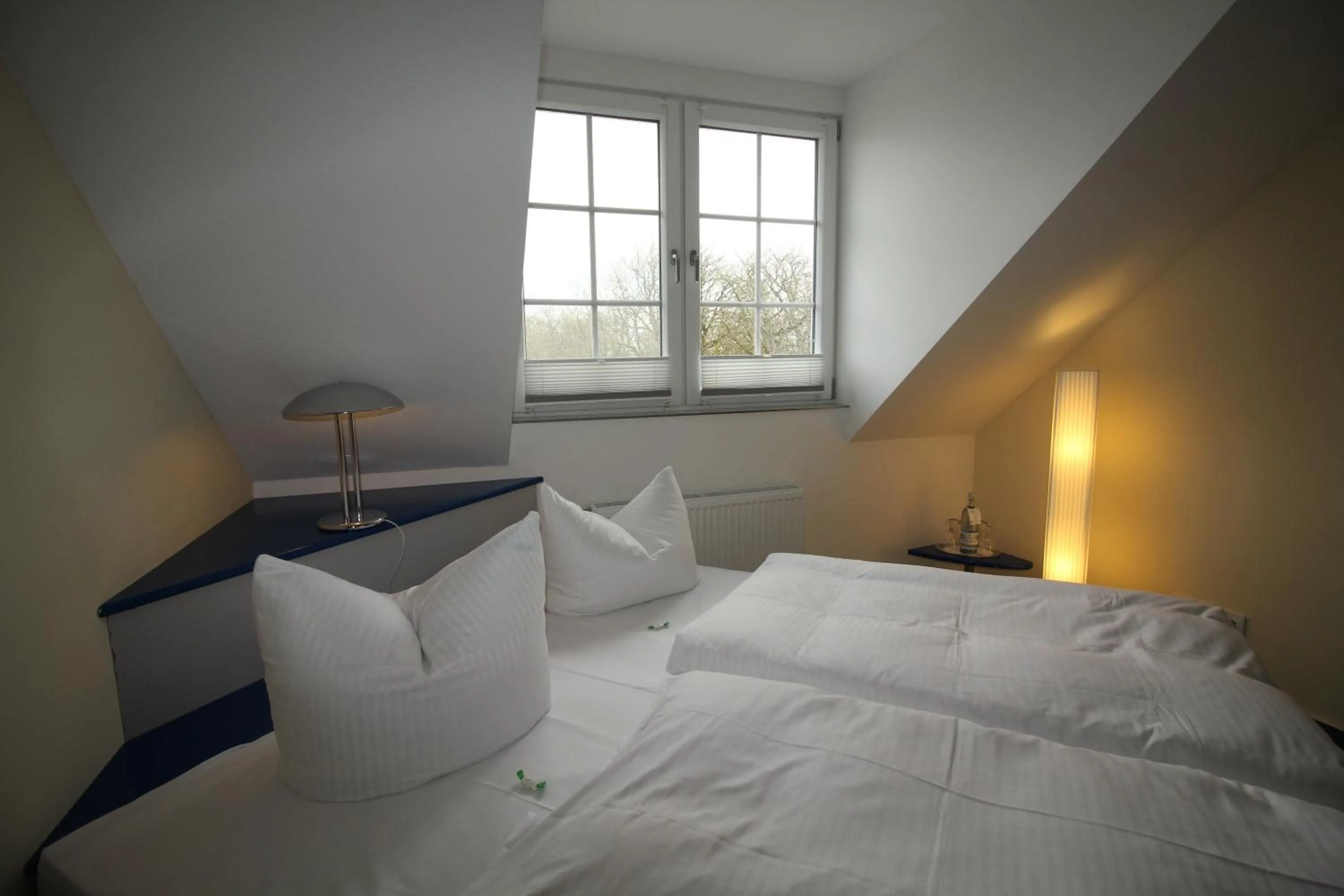 Photo of the whole room, Bed in Parkhotel Klüschenberg