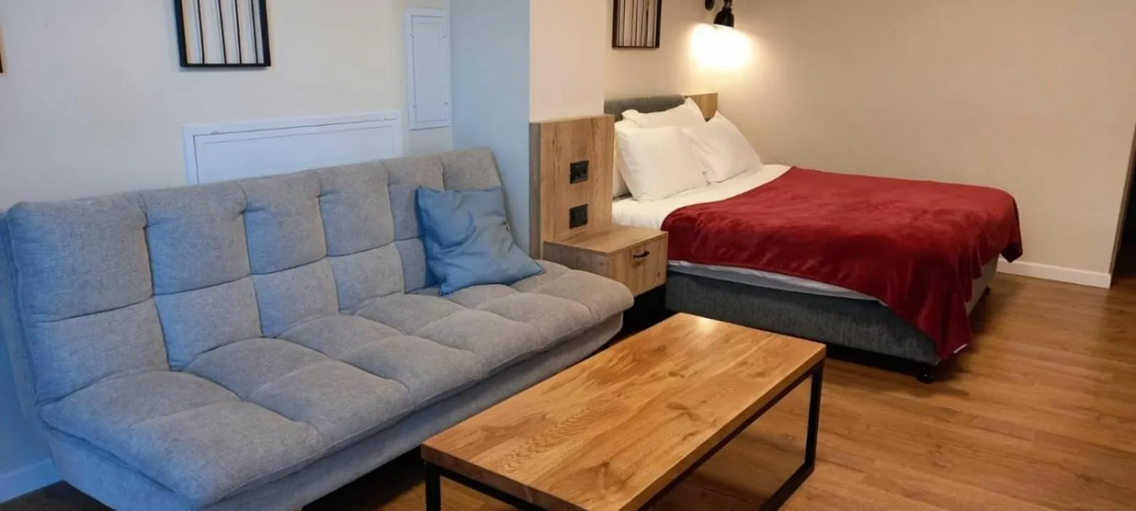 Living room, Bed in Apartique Hotel