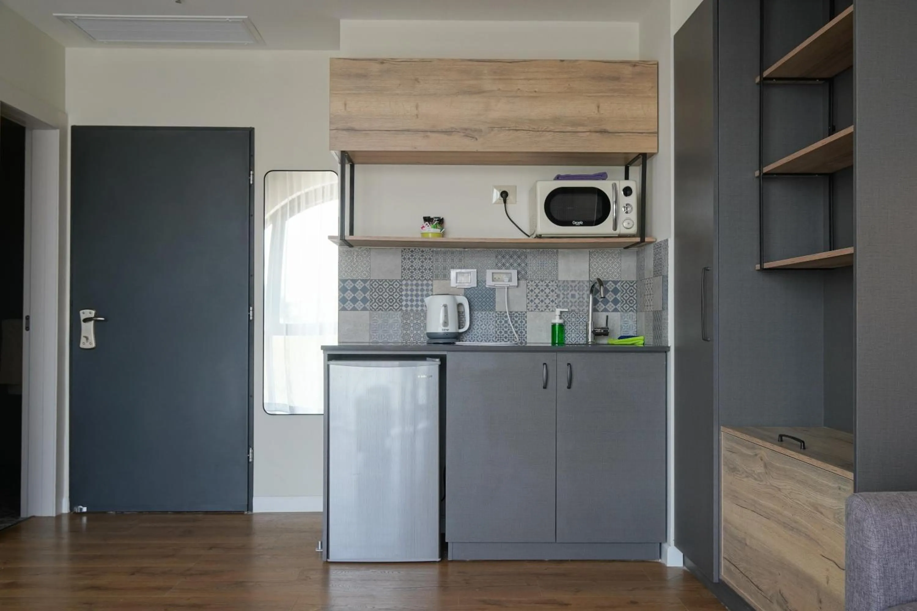 Kitchen or kitchenette in Apartique Hotel