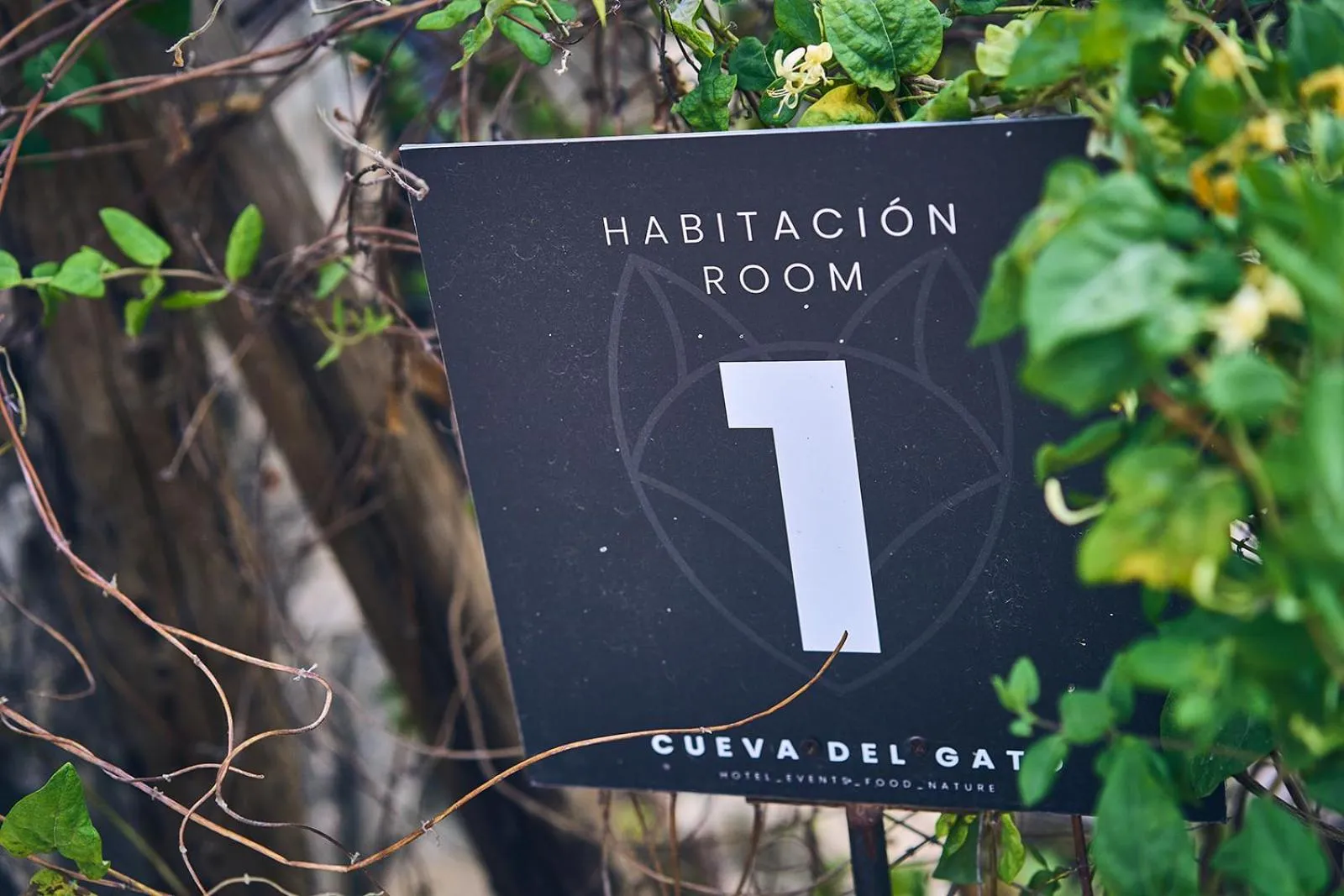 Property logo or sign in Eco Hotel Cueva del Gato