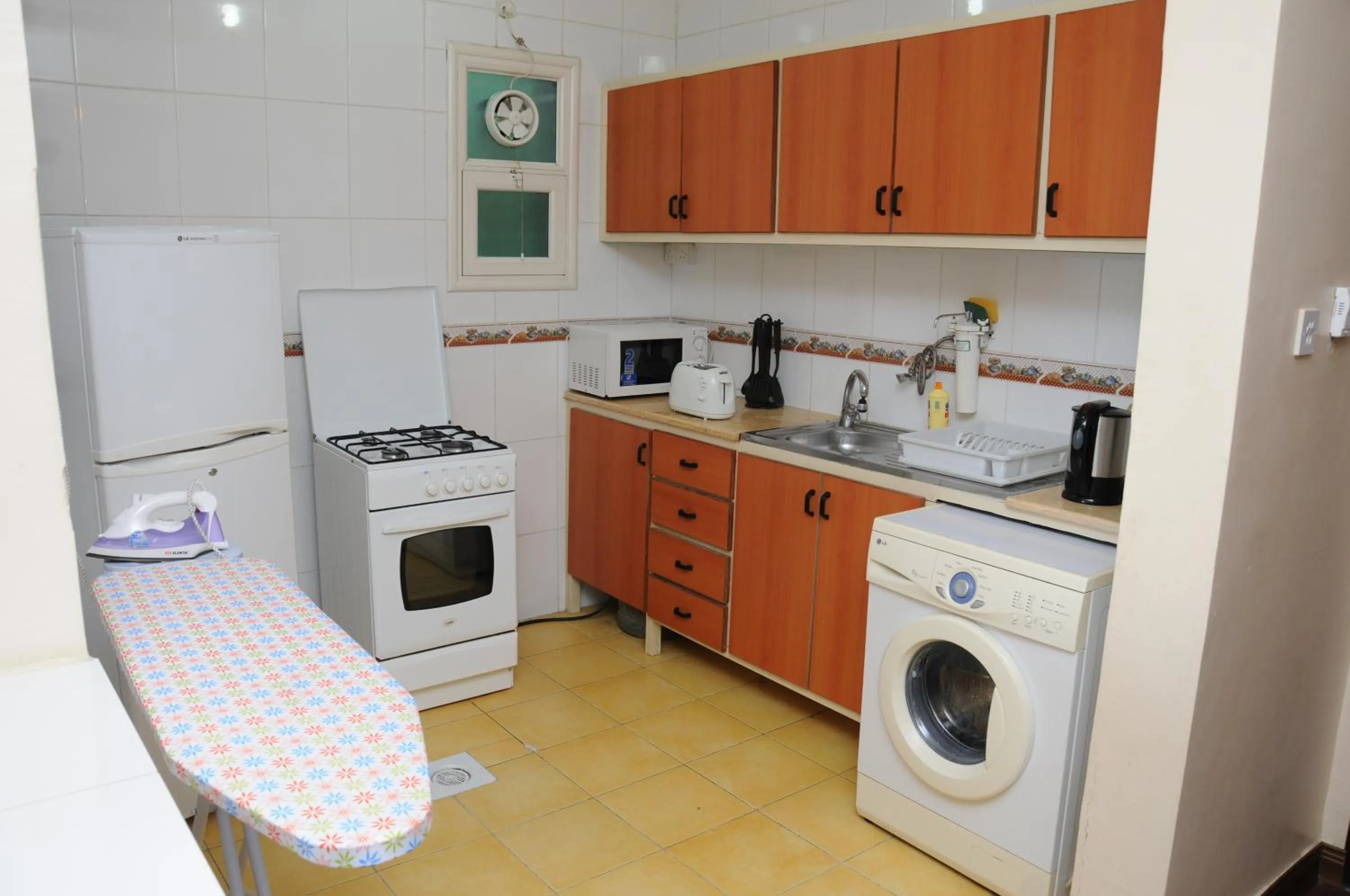 Kitchen or kitchenette in Arinza Tower Quality Apartments
