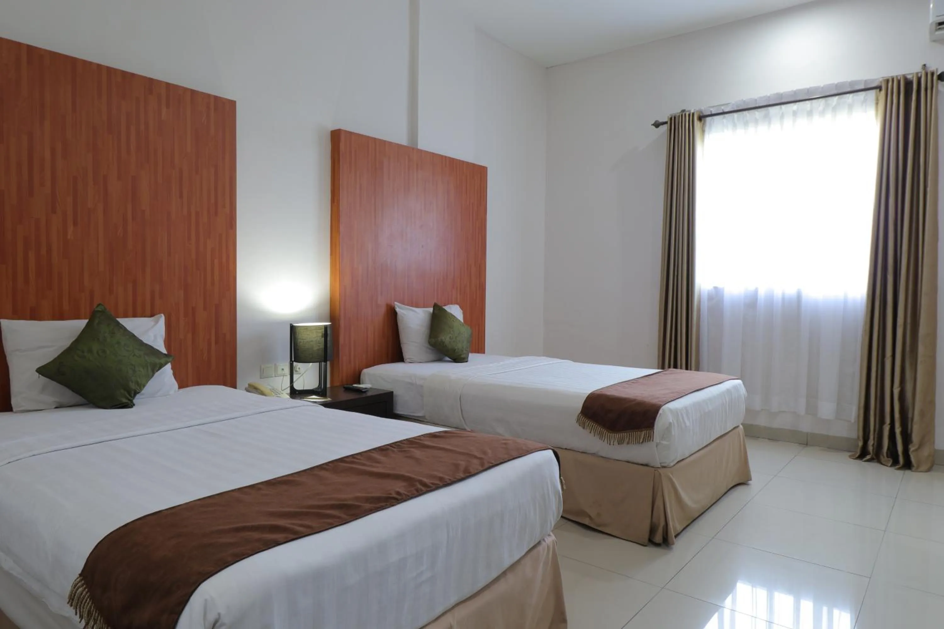 Bed in Saka Hotel Medan