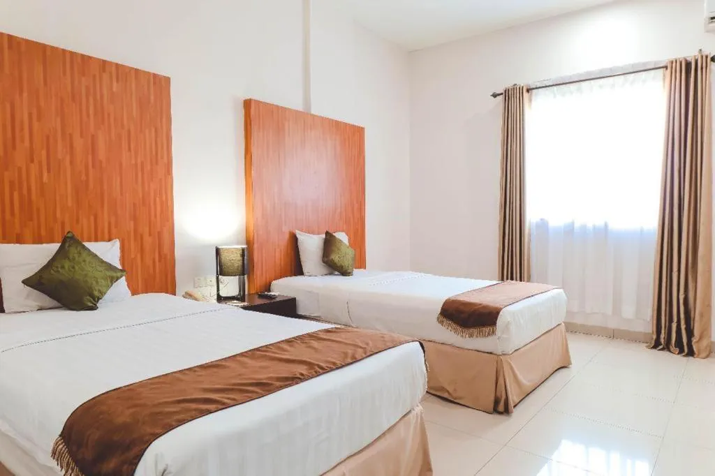 Bed in Saka Hotel Medan