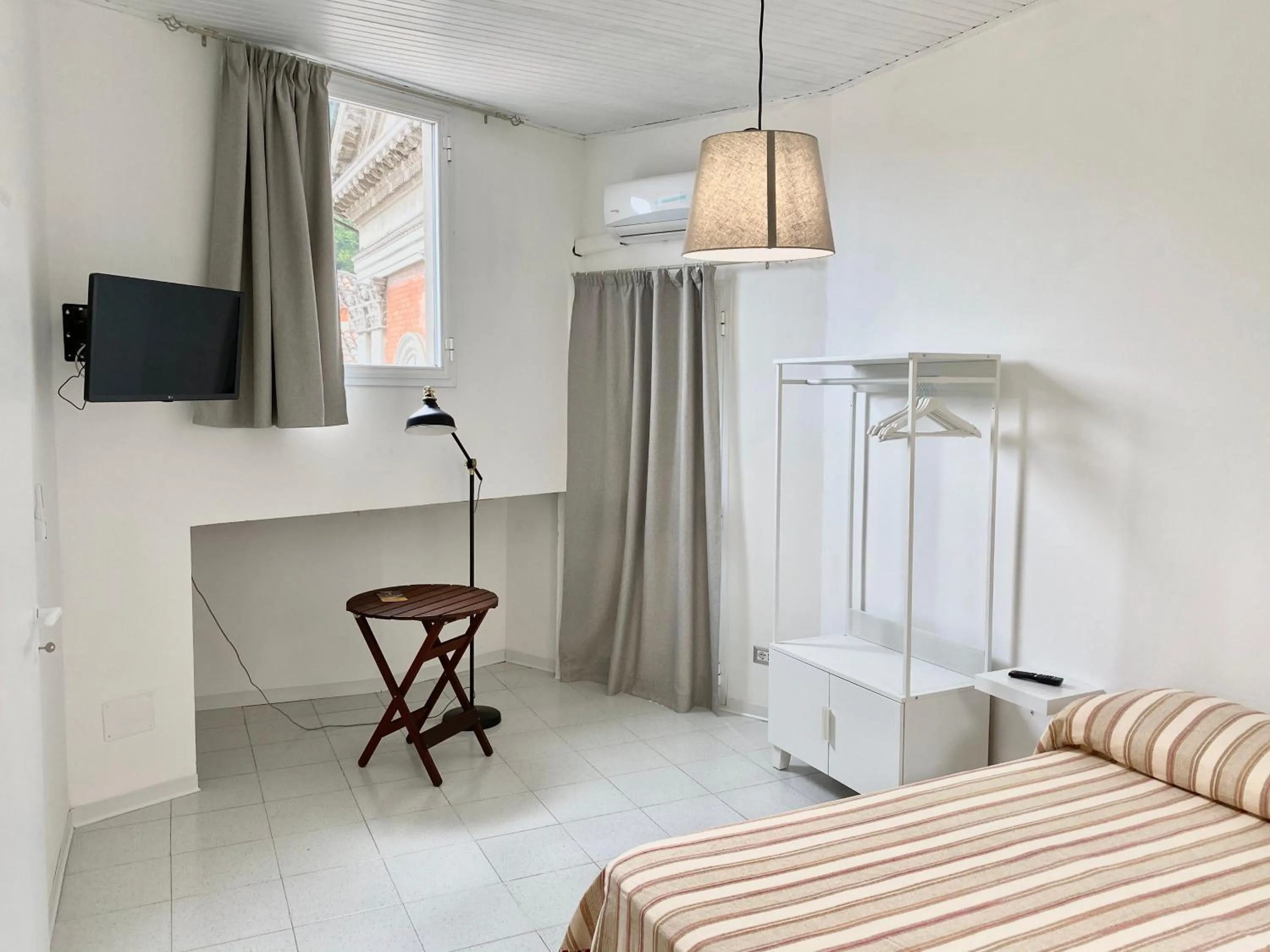 Bed in Il Cavalier Veggiani B&B