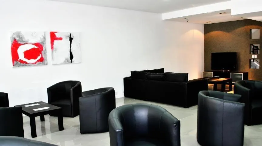 Communal lounge/ TV room, Lounge/Bar in Pilar Apart Hotel