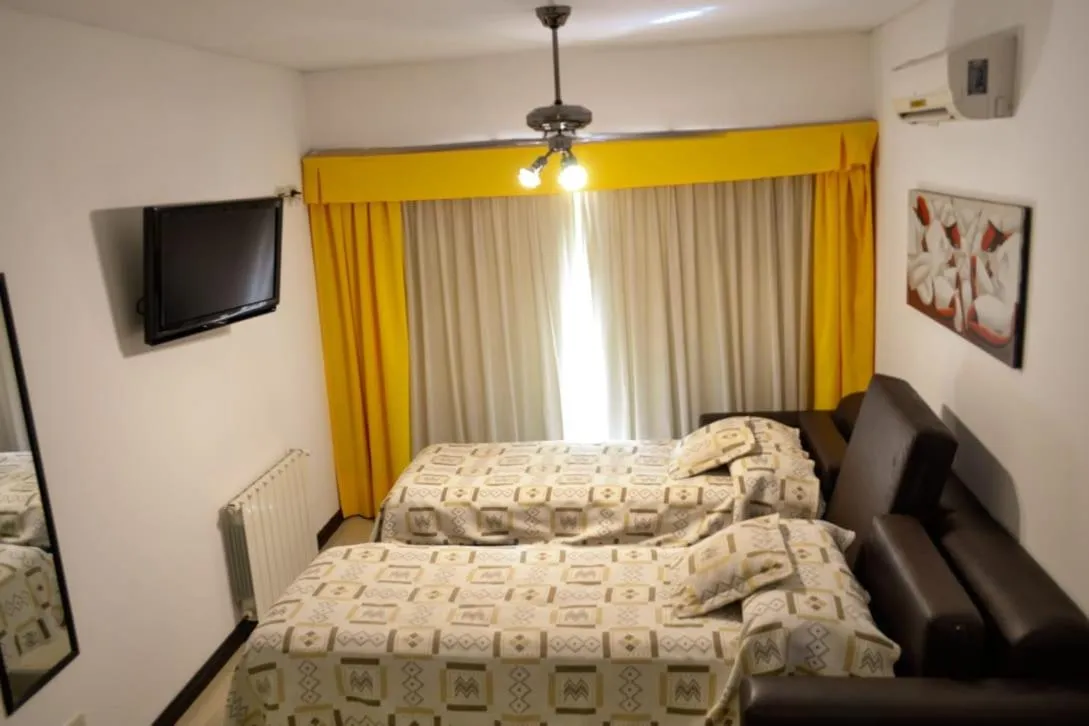 TV/Entertainment Center in Pilar Apart Hotel