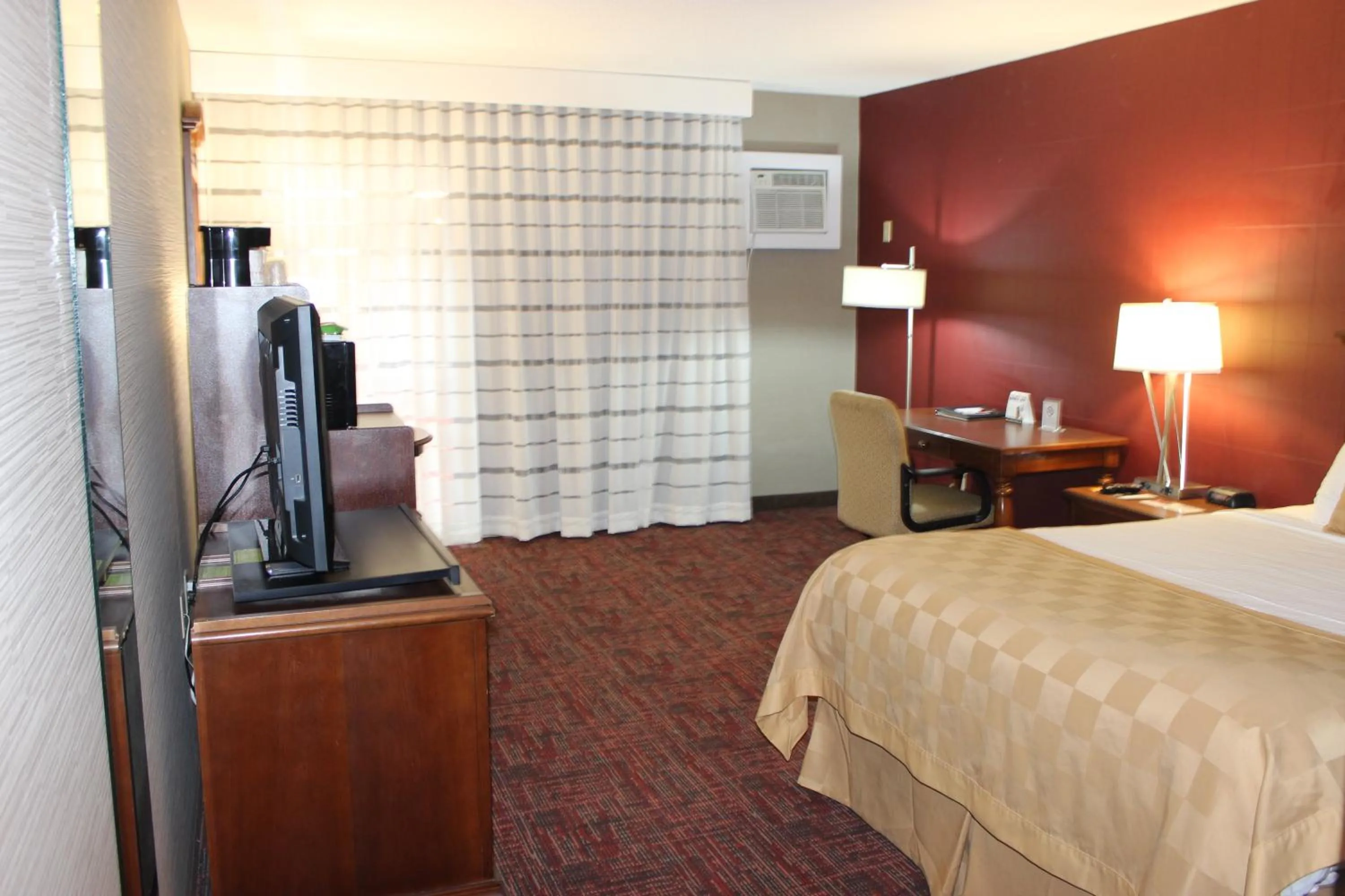 Bed in Ramada by Wyndham Grand Forks