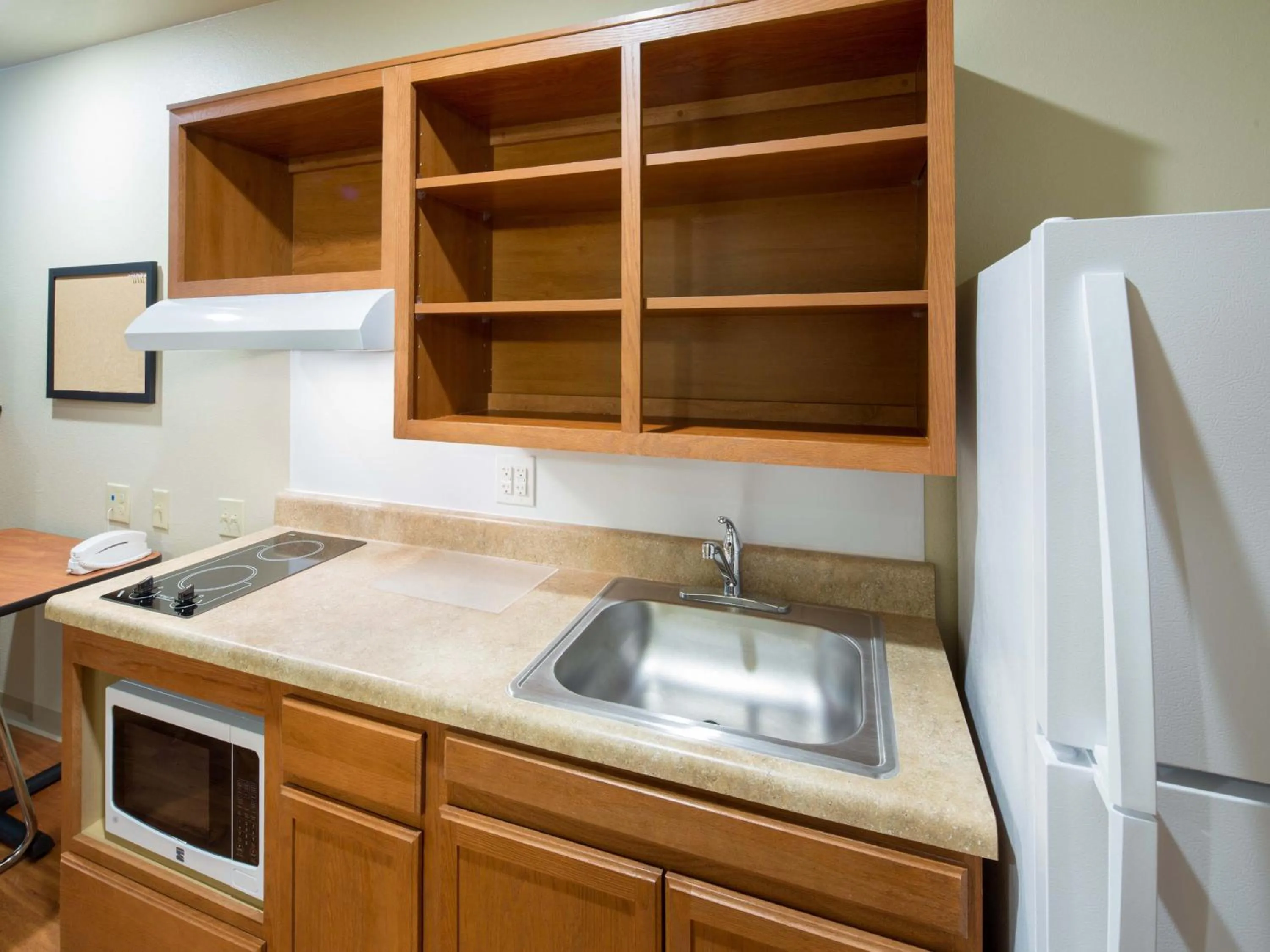 Kitchen or kitchenette in WoodSpring Suites Junction City