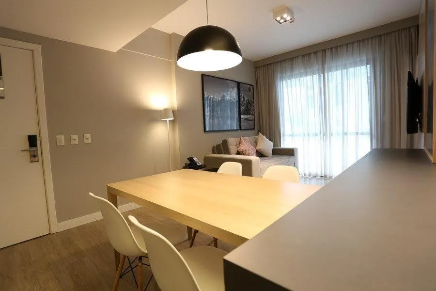 Living room in Astron Suítes Mondial Salvador by Nobile