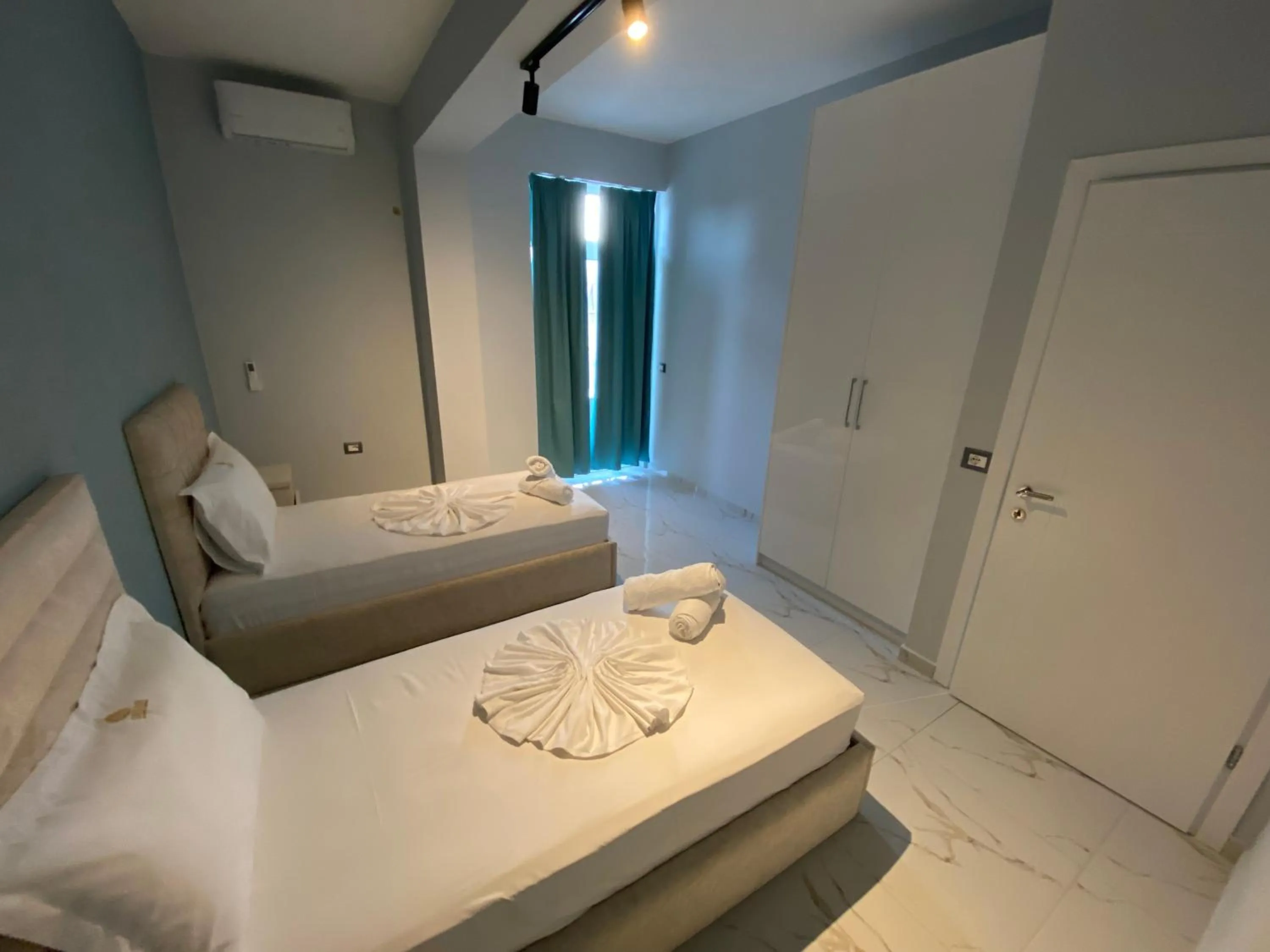 Photo of the whole room, Bed in DREAM APARTMENTS Saranda