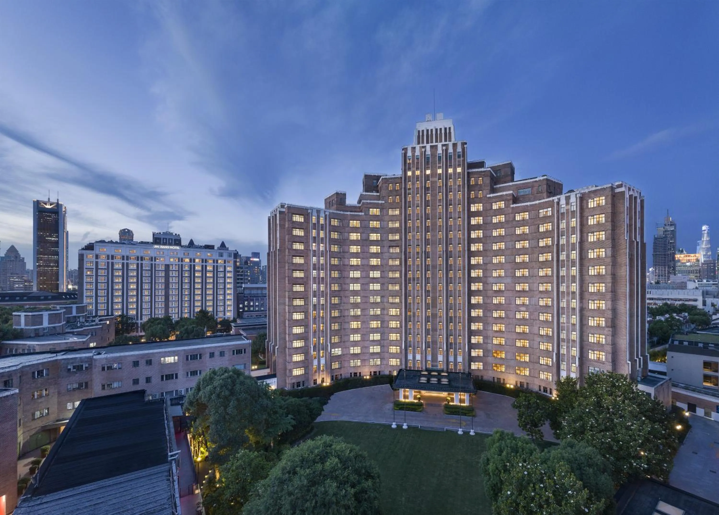 Property building in Jin Jiang Hotel Shanghai - historical hotel in the city-center of Huaihai shopping area and convenient access to metro lines