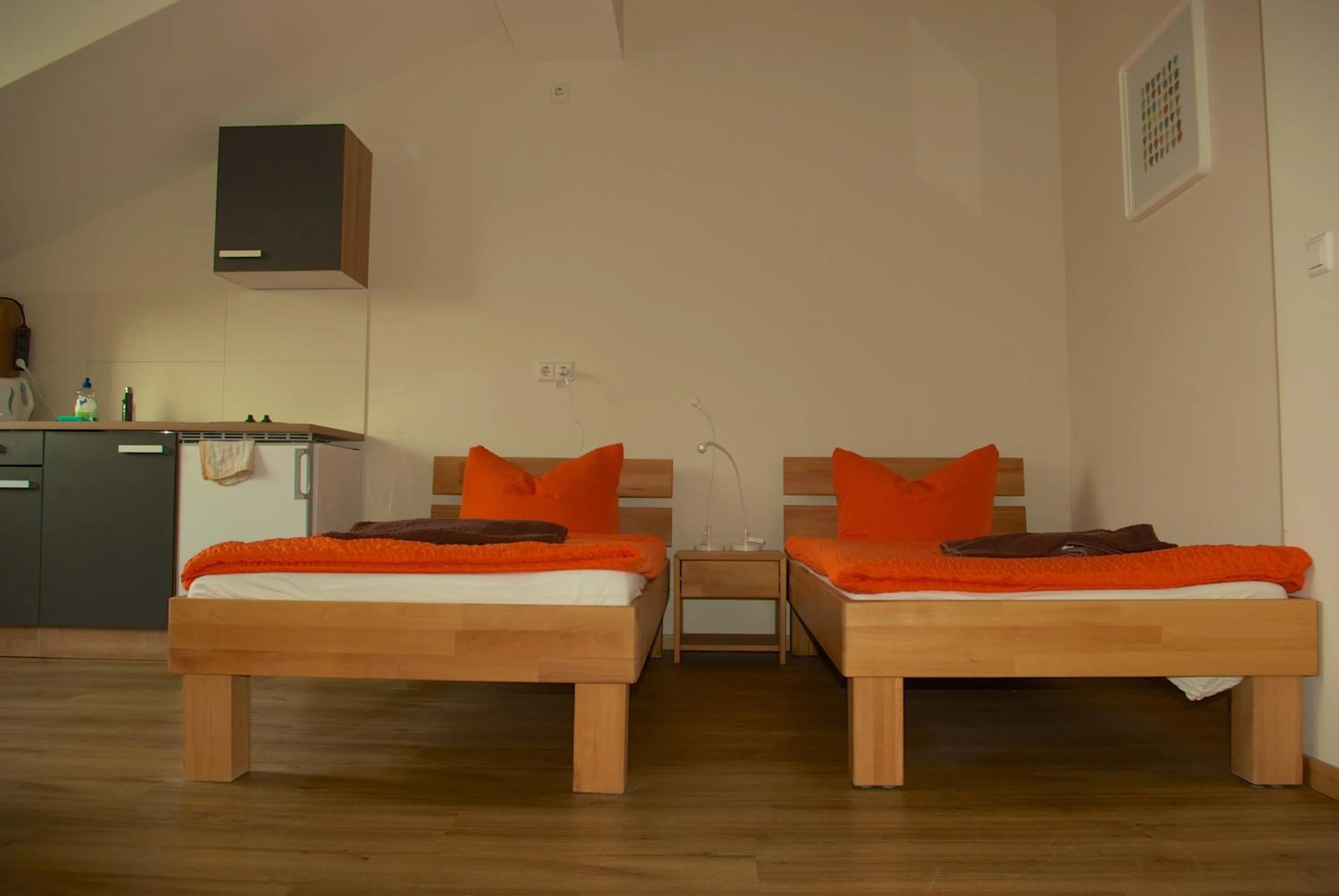 Kitchen or kitchenette, Bed in Apartmentpension am Stadtschloss