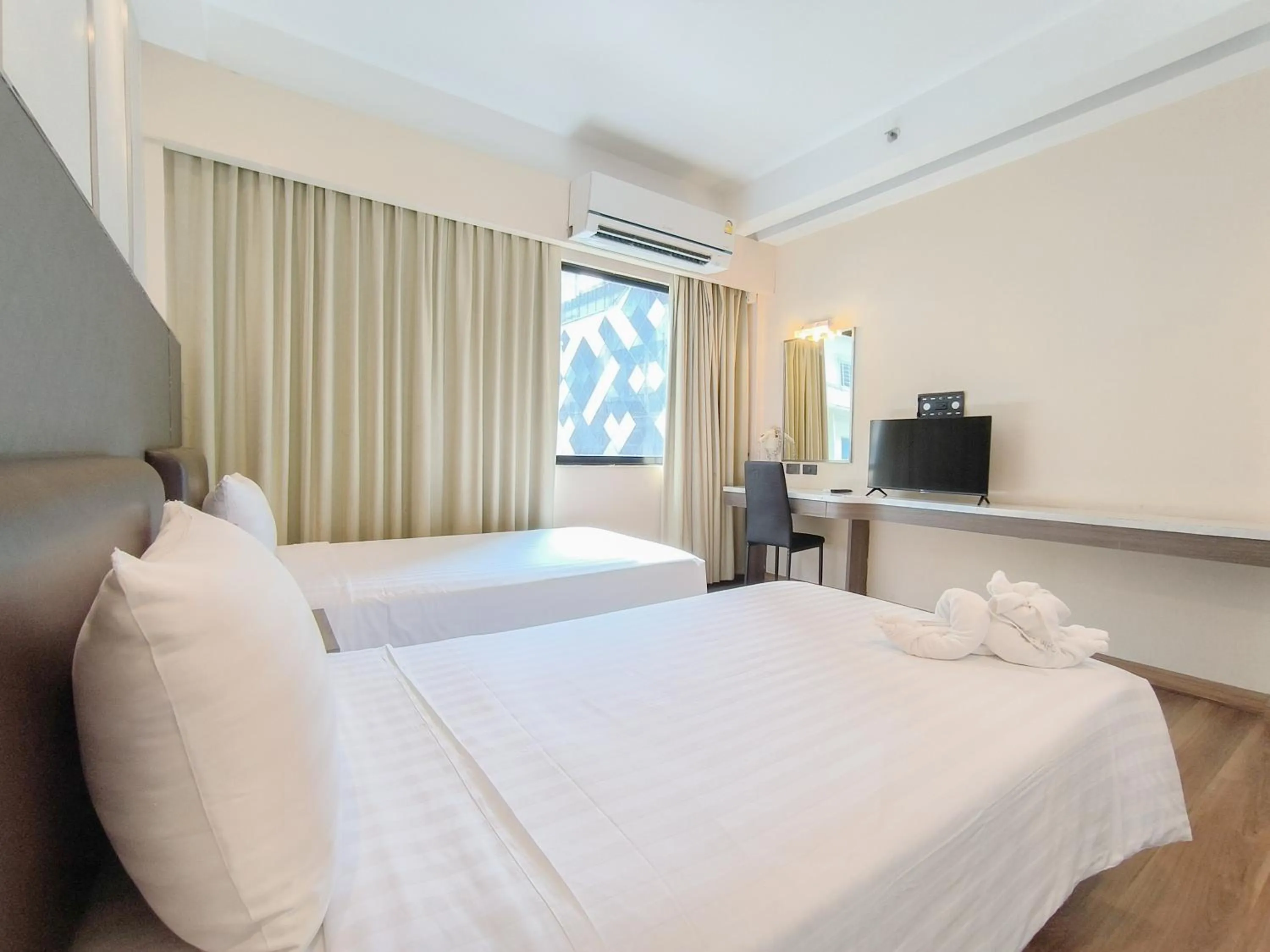 Bed in Citin Sukhumvit 11 Nana Bangkok by Compass Hospitality
