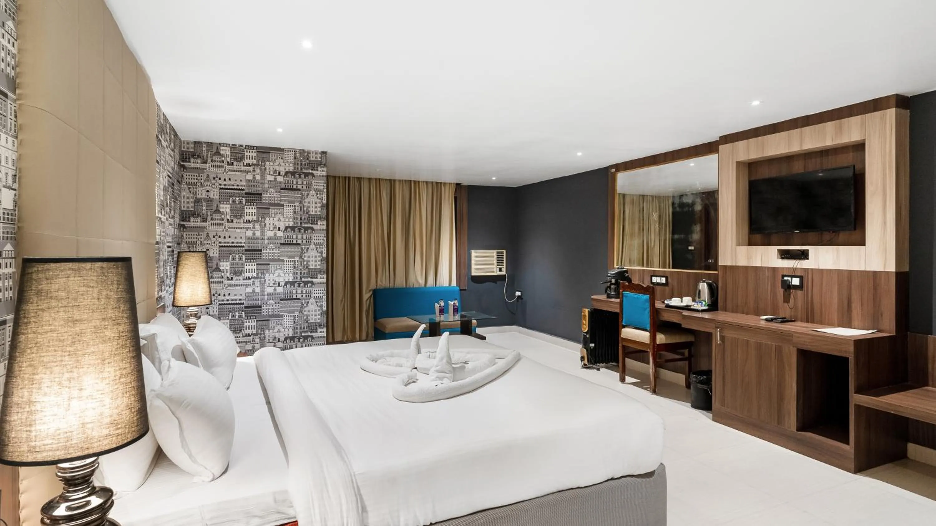 TV and multimedia, Bed in Niranjana Hotel Bodhgaya