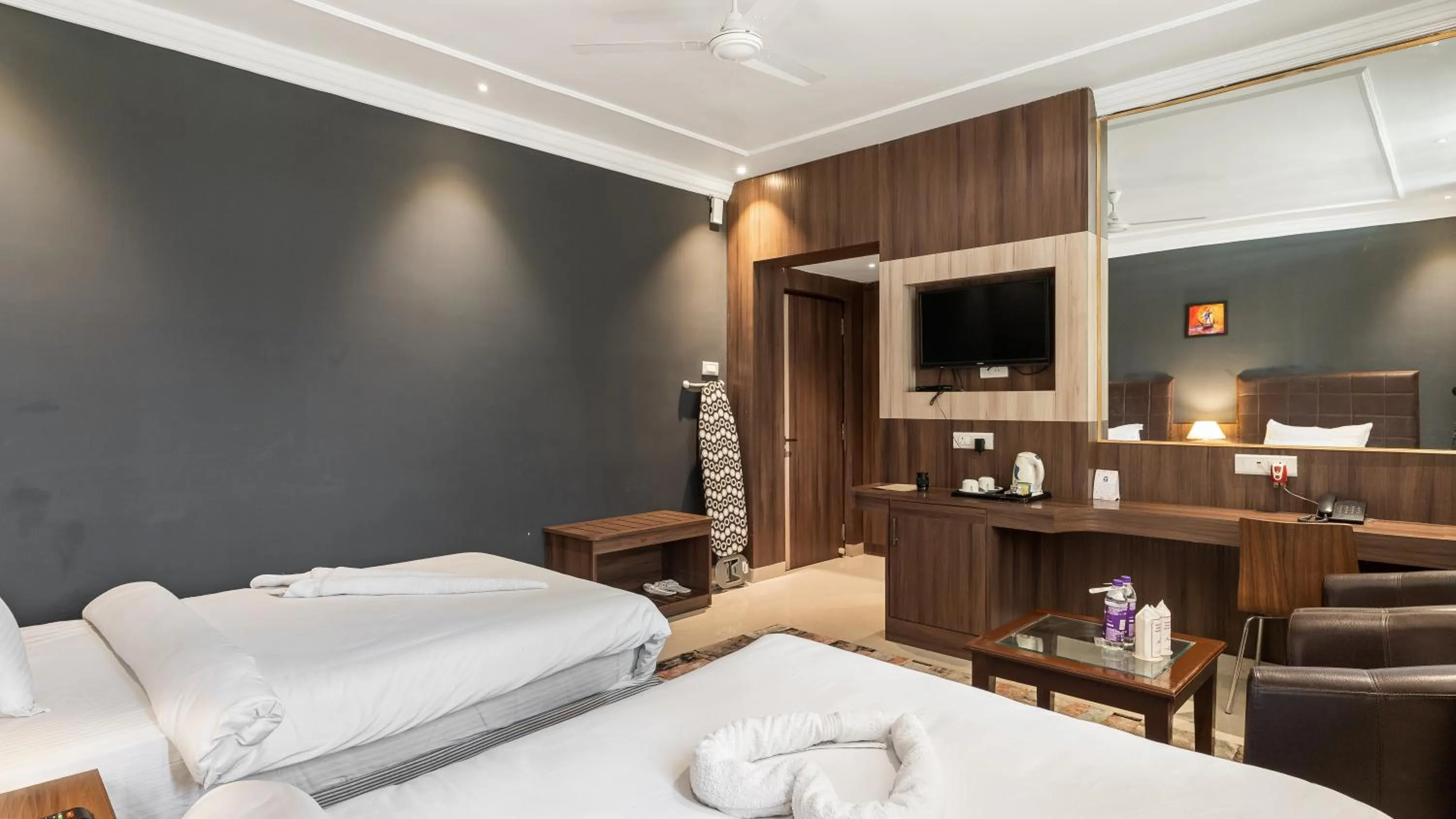 TV and multimedia, Bed in Niranjana Hotel Bodhgaya