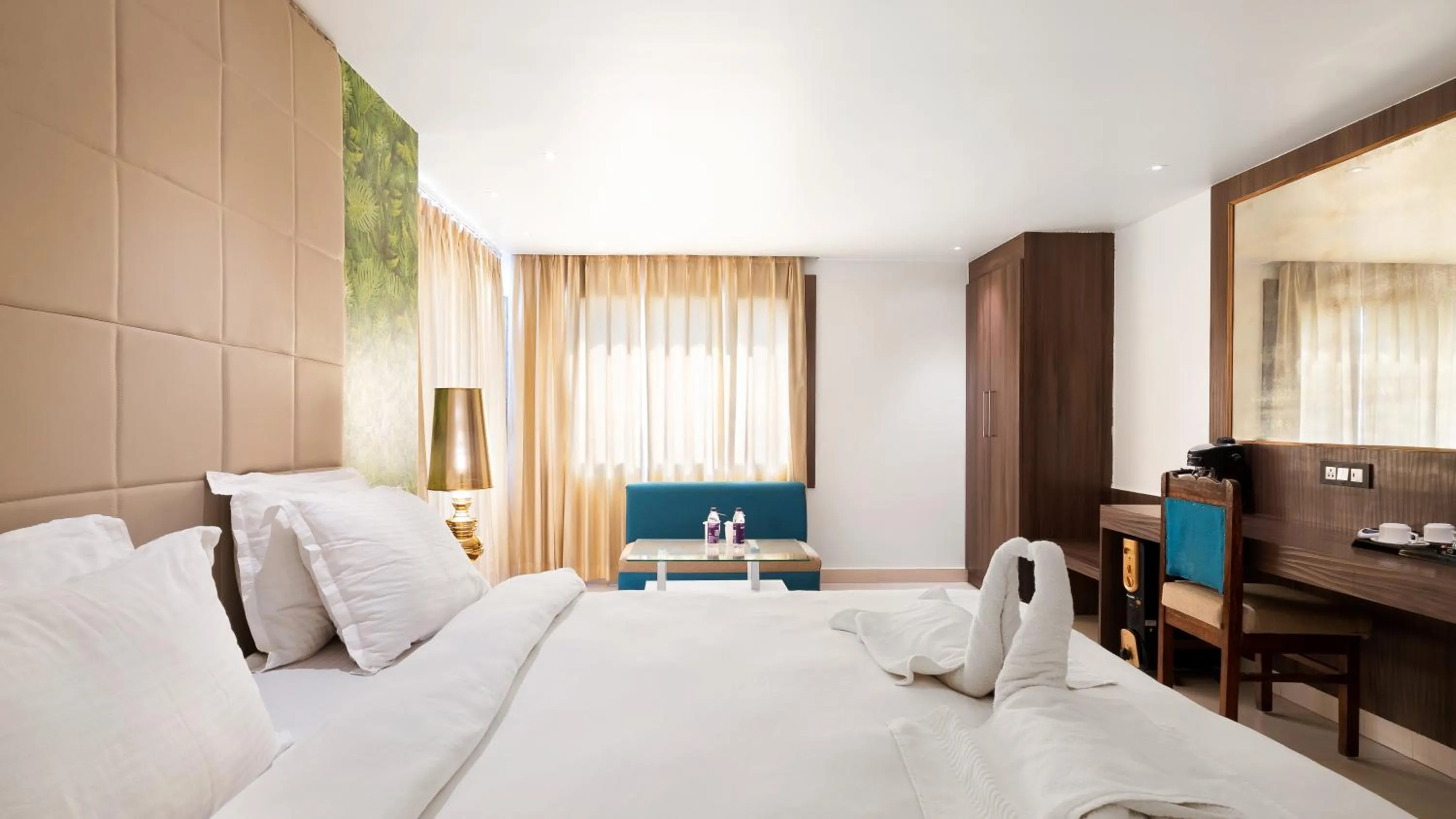 Bed in Niranjana Hotel Bodhgaya