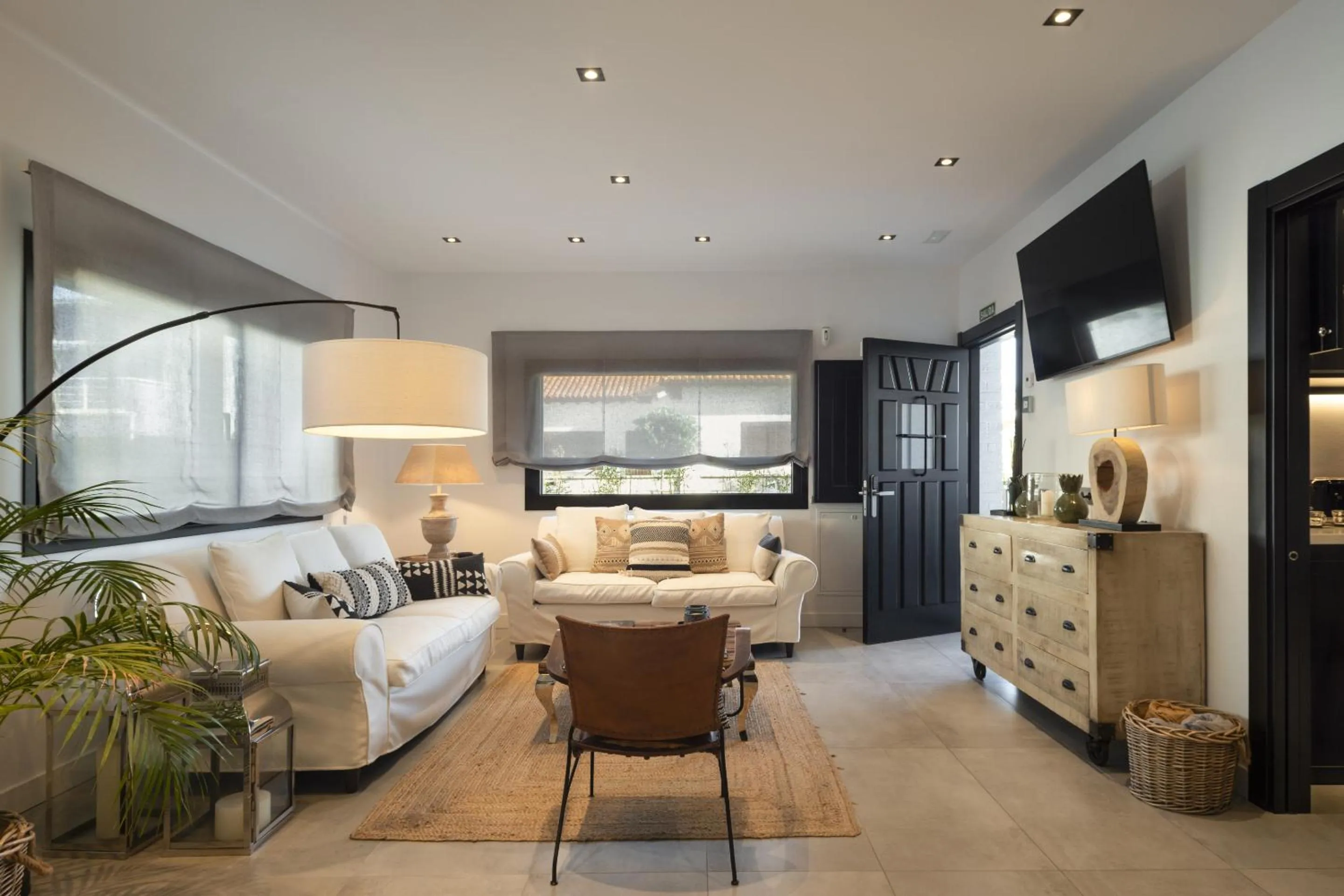 Dining area, Bed in La Playa Suites Suances