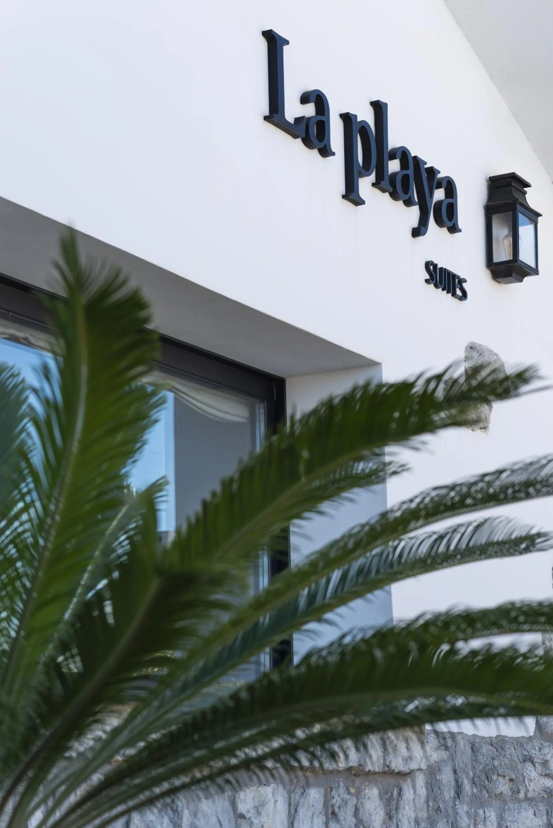 Property logo or sign in La Playa Suites Suances