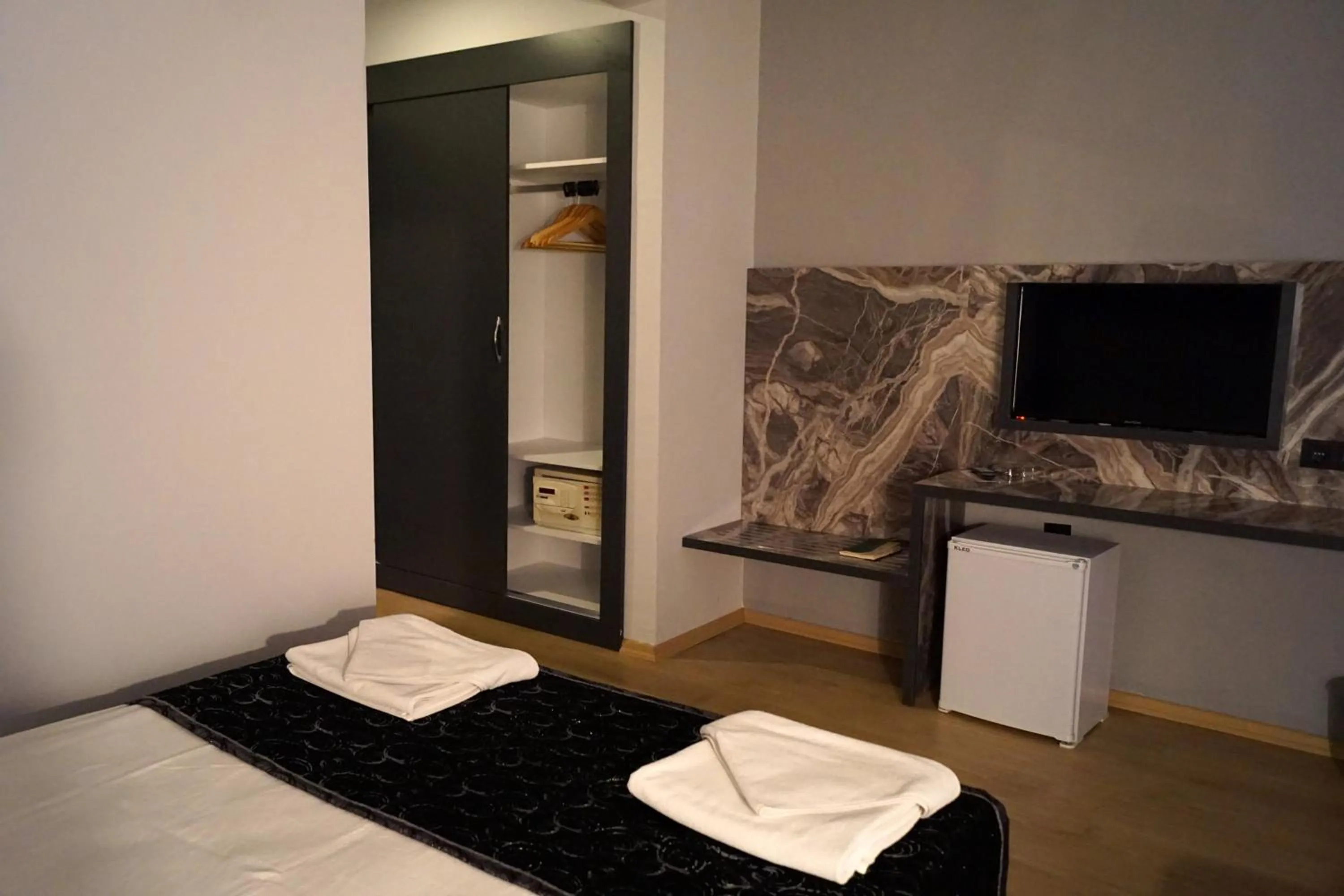 Bed in Aslan Sand & City Hotel