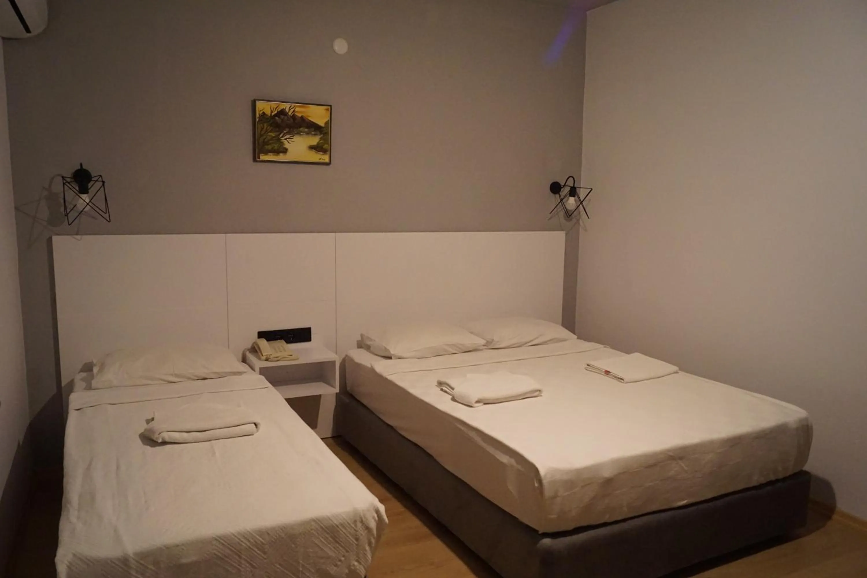 Bed in Aslan Sand & City Hotel