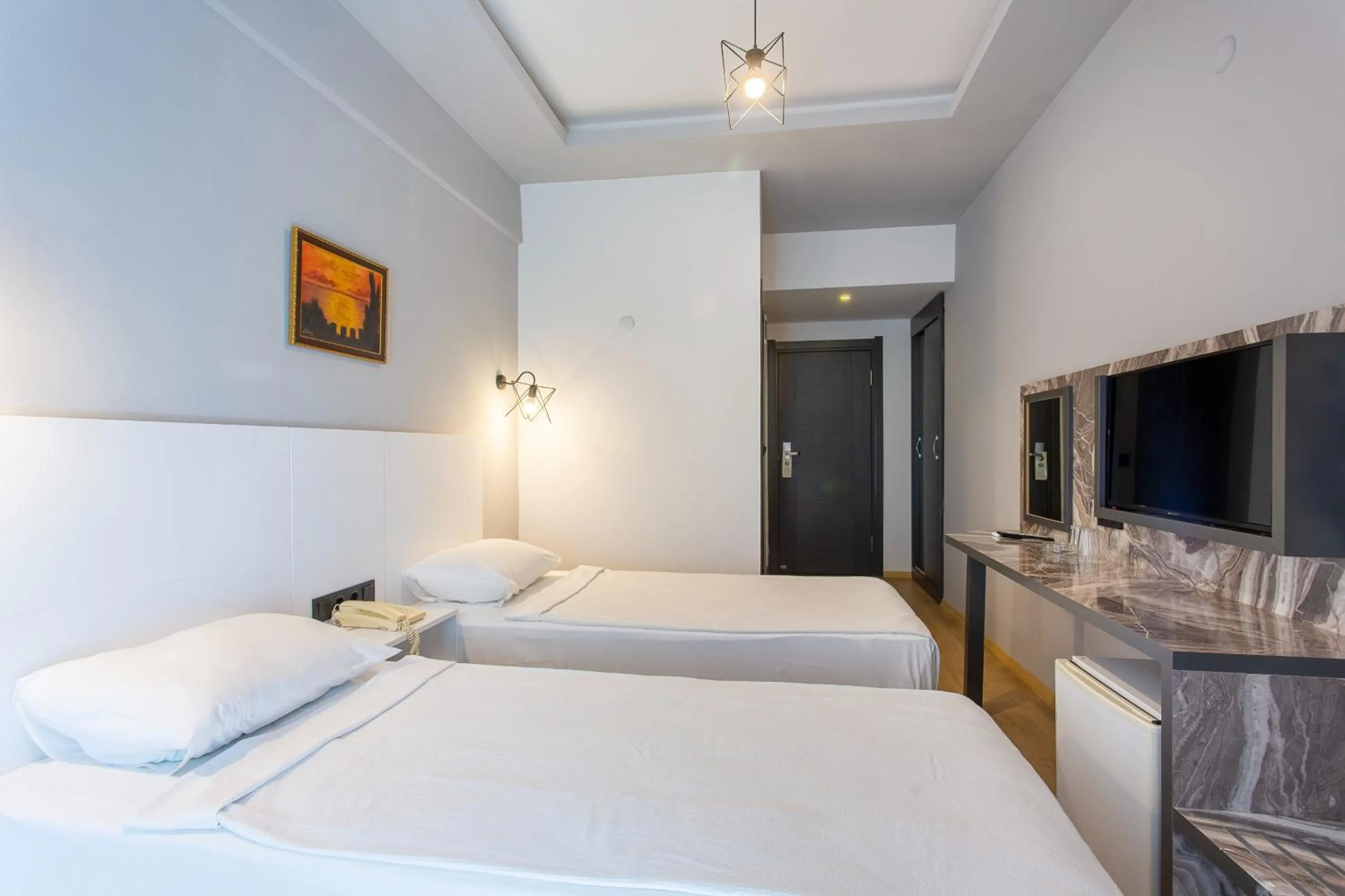 Bed in Aslan Sand & City Hotel