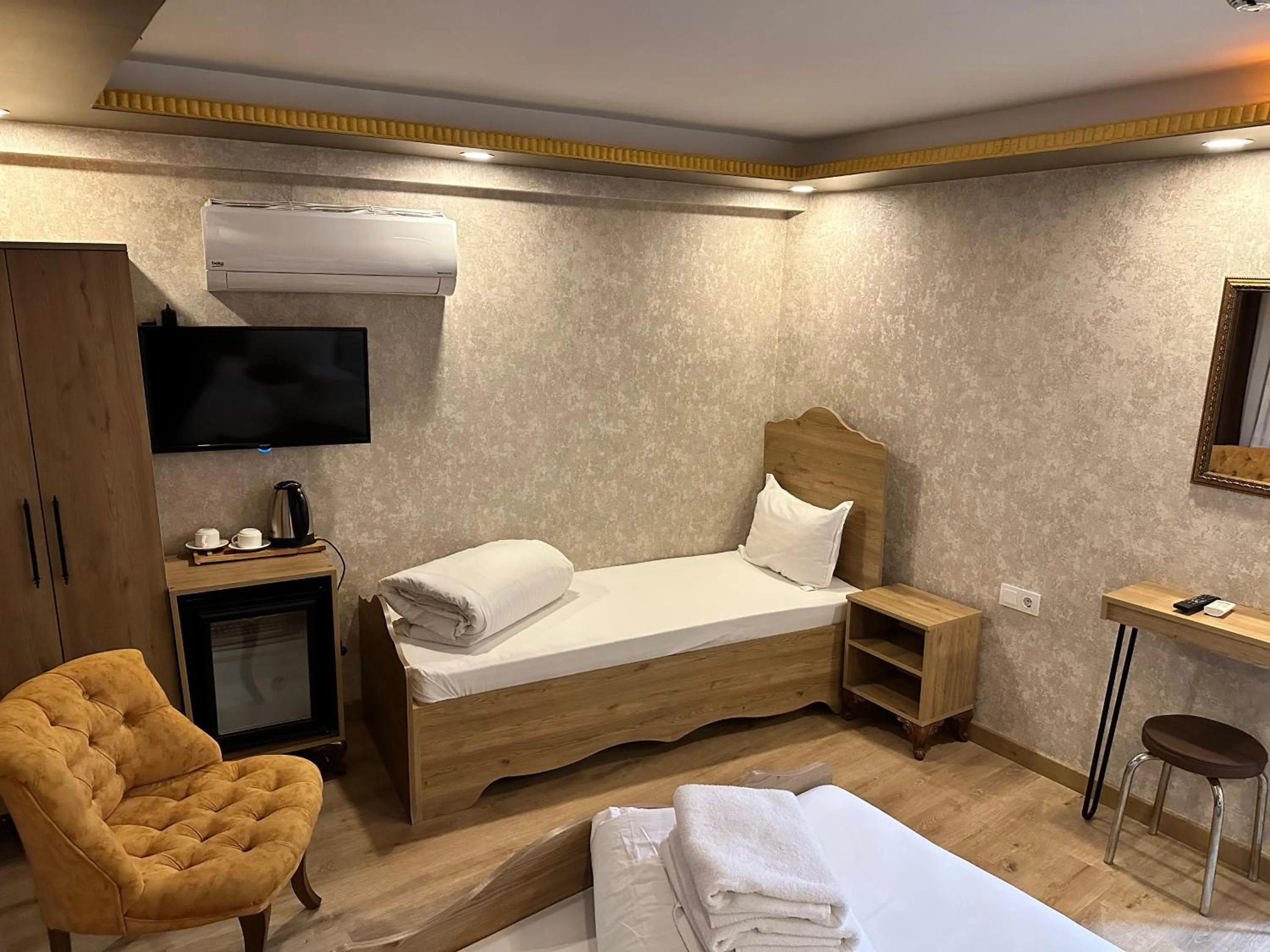 Bed in Golden Sail Hotel Old City