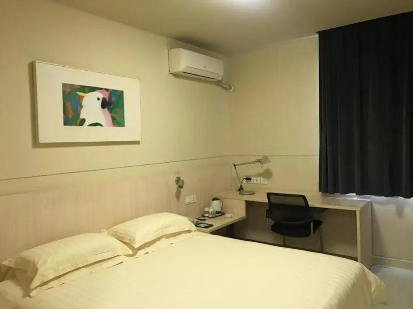Bed in Jinjiang Inn Xuzhou Xinyi Municipal Government