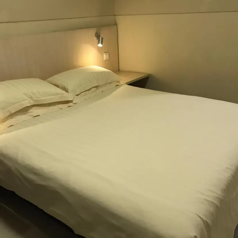 Bed in Jinjiang Inn Xuzhou Xinyi Municipal Government