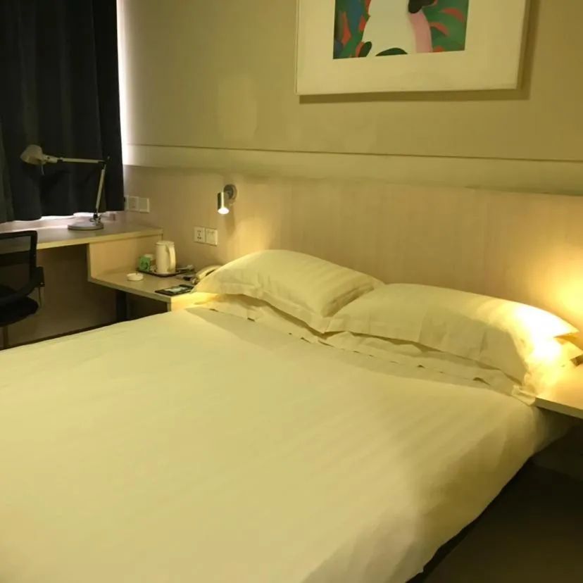 Bed in Jinjiang Inn Xuzhou Xinyi Municipal Government