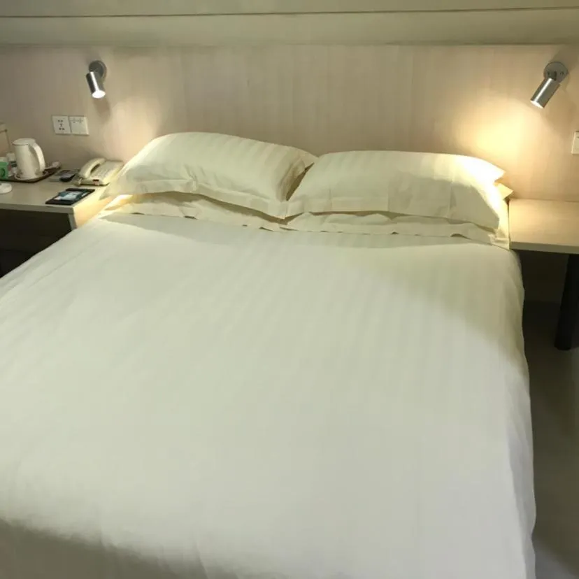 Bed in Jinjiang Inn Xuzhou Xinyi Municipal Government
