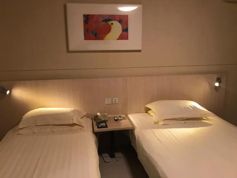 Bed in Jinjiang Inn Xuzhou Xinyi Municipal Government