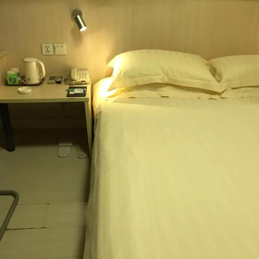 Bed in Jinjiang Inn Xuzhou Xinyi Municipal Government