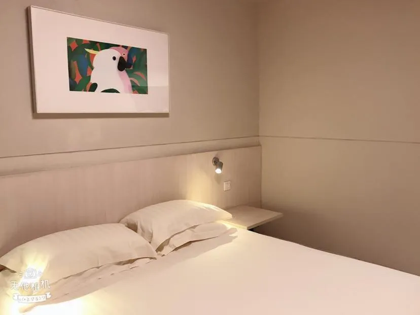 Bed in Jinjiang Inn Xuzhou Xinyi Municipal Government