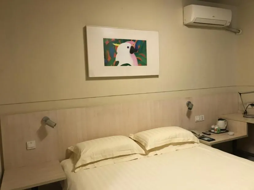 Bed in Jinjiang Inn Xuzhou Xinyi Municipal Government