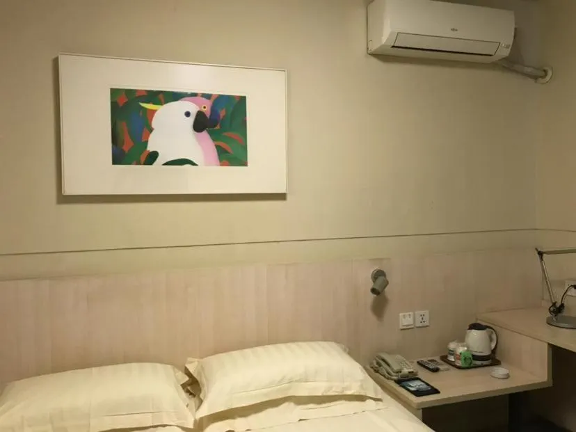 Bed in Jinjiang Inn Xuzhou Xinyi Municipal Government