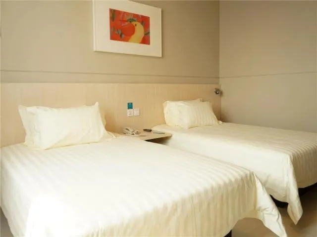 Bed in Jinjiang Inn Yingkou Port Authority Bayuquan Century Plaza