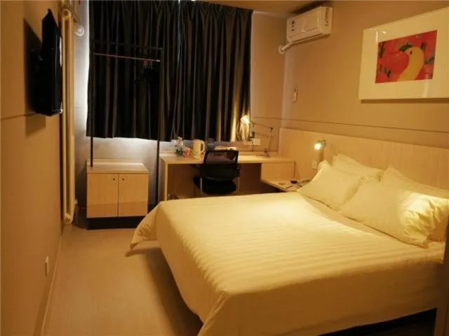 Bed in Jinjiang Inn Yingkou Port Authority Bayuquan Century Plaza