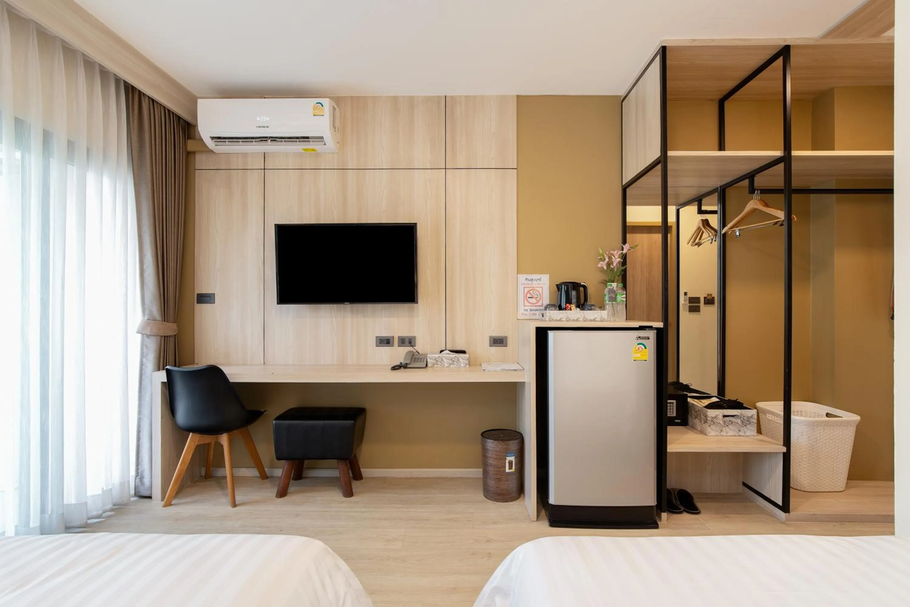 TV and multimedia, Bed in Amanah Bangkok Hotel